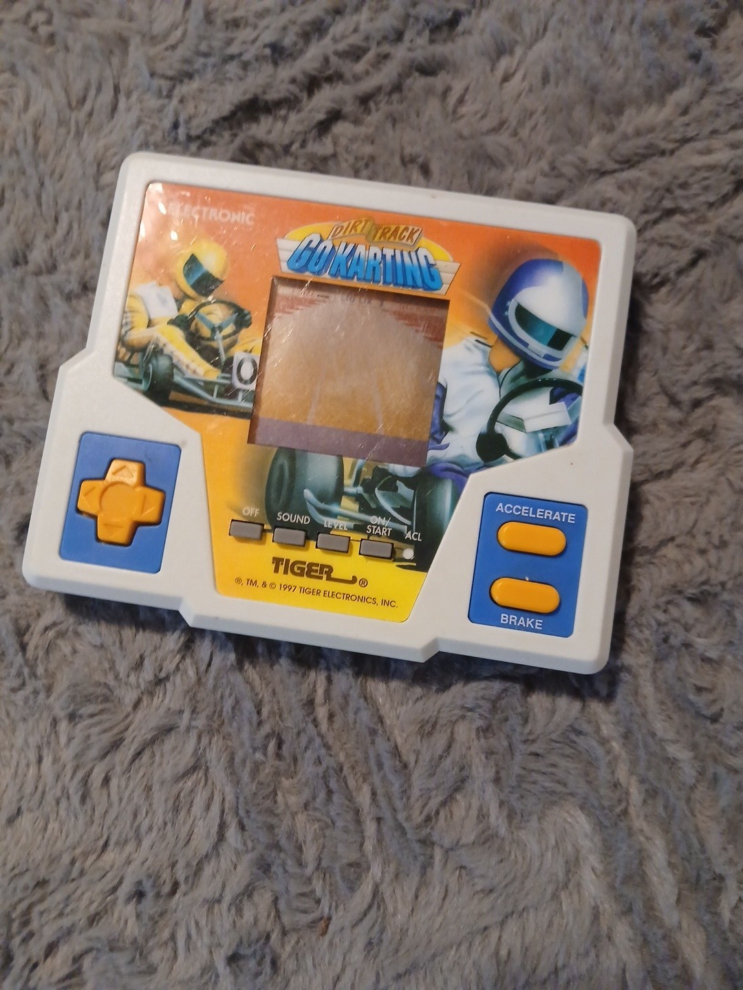 1990s DIRT TRACK GO KARTING ELECTRONIC HANDHELD TRAVEL GAME TRAVEL TIGER LCD TOY