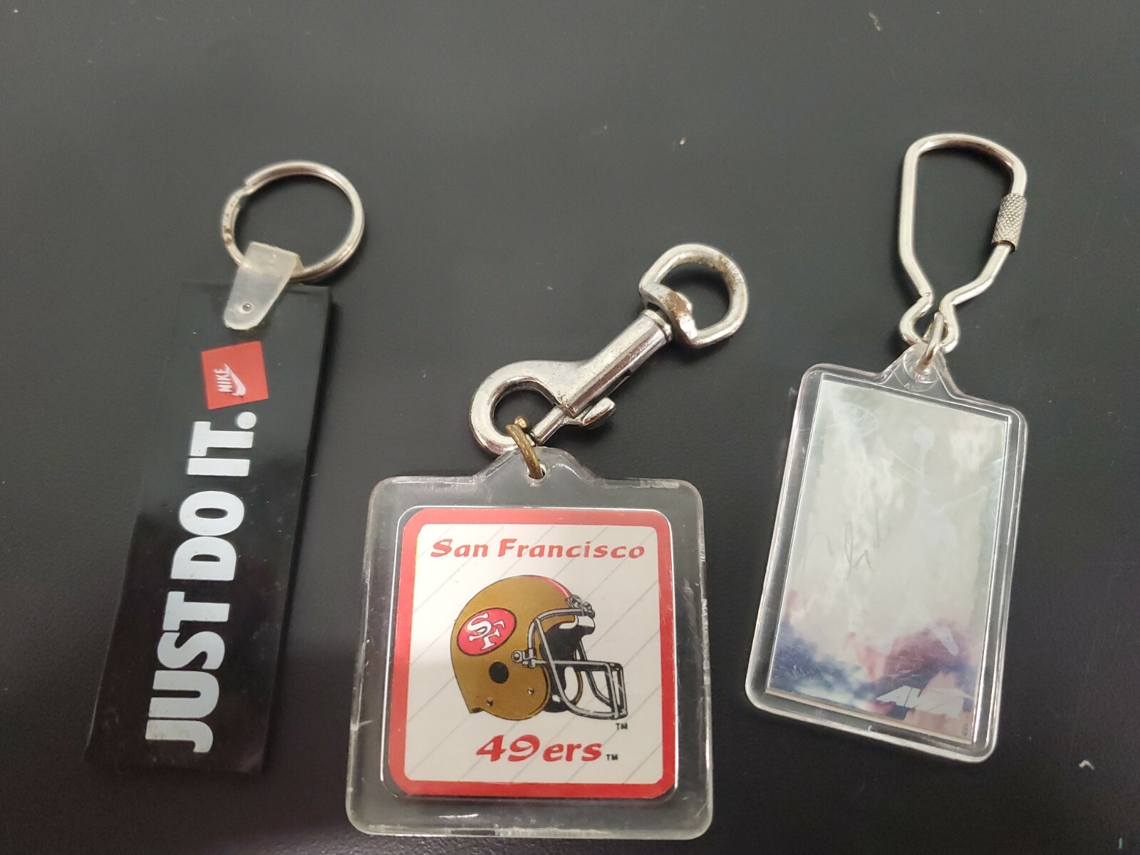 Vtg 1980's Keychain Lot of 3 Nike just do it, san fran 49ers ,Clyde Drexler AVIA