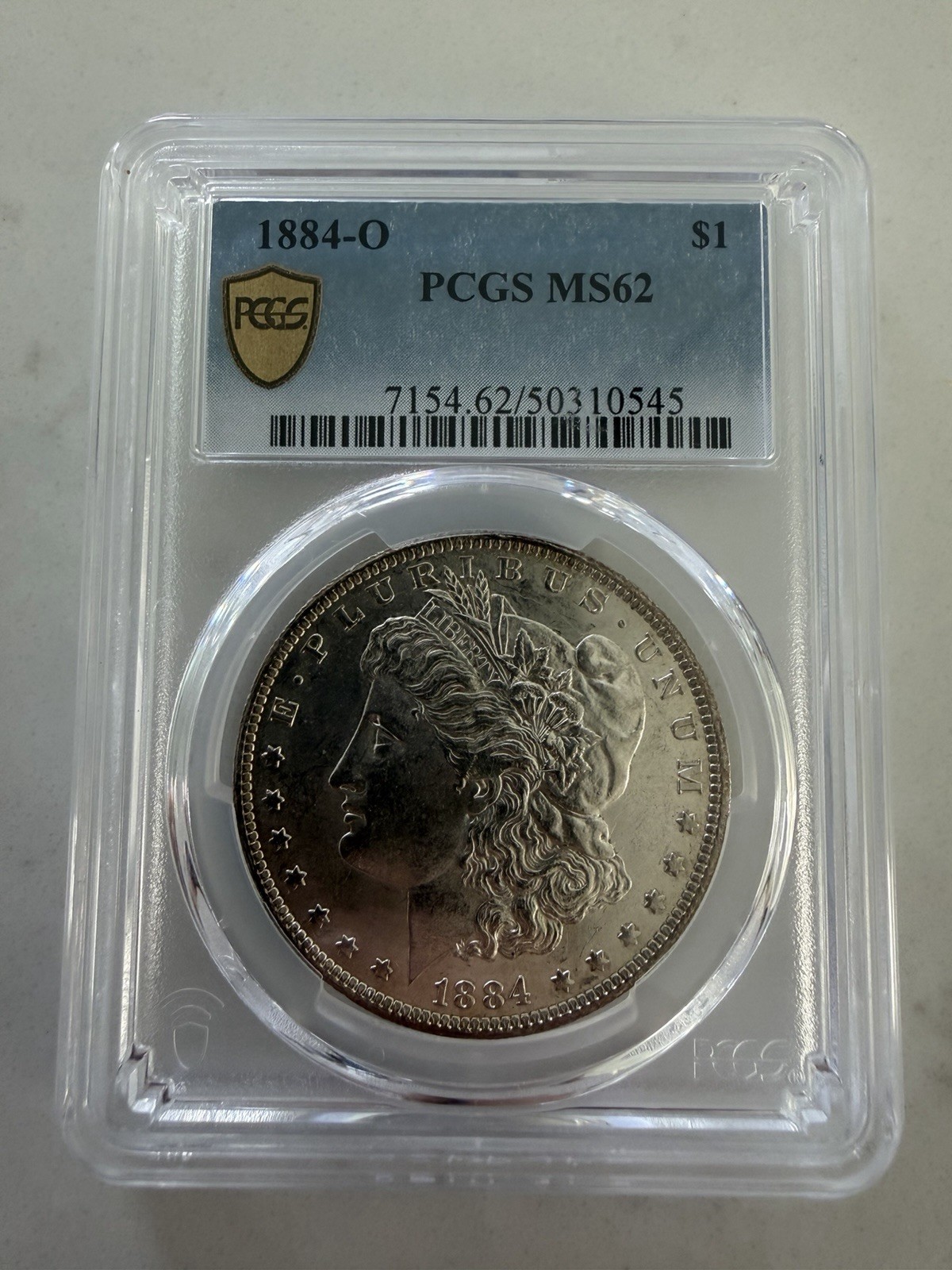 1884 O Morgan Silver Dollar PCGS MS62 Gold TrueView Slabbed 90% Silver