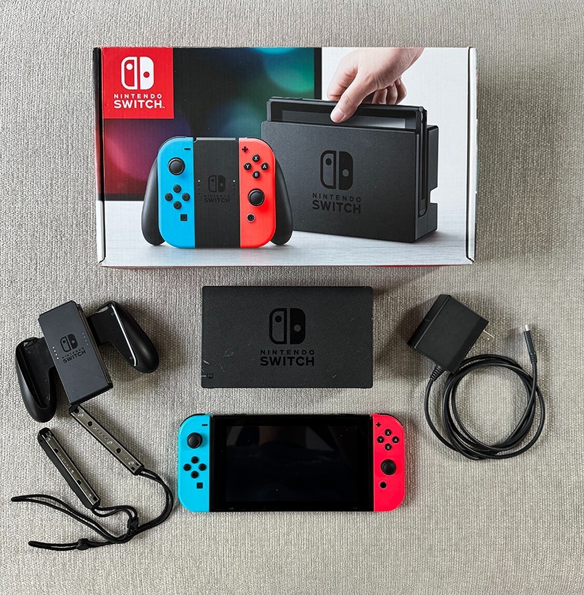 Nintendo Switch Console Plus Neon Red and Neon Blue Joy-Con set