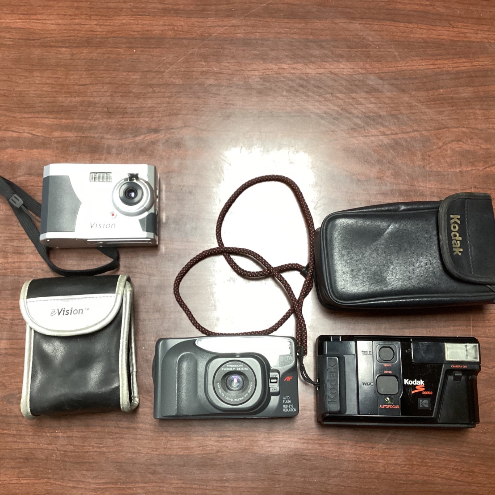 Lot of 3 Cameras: Kodak S900 W/case, Envision Megapro w/ Case & Minolta Freedom