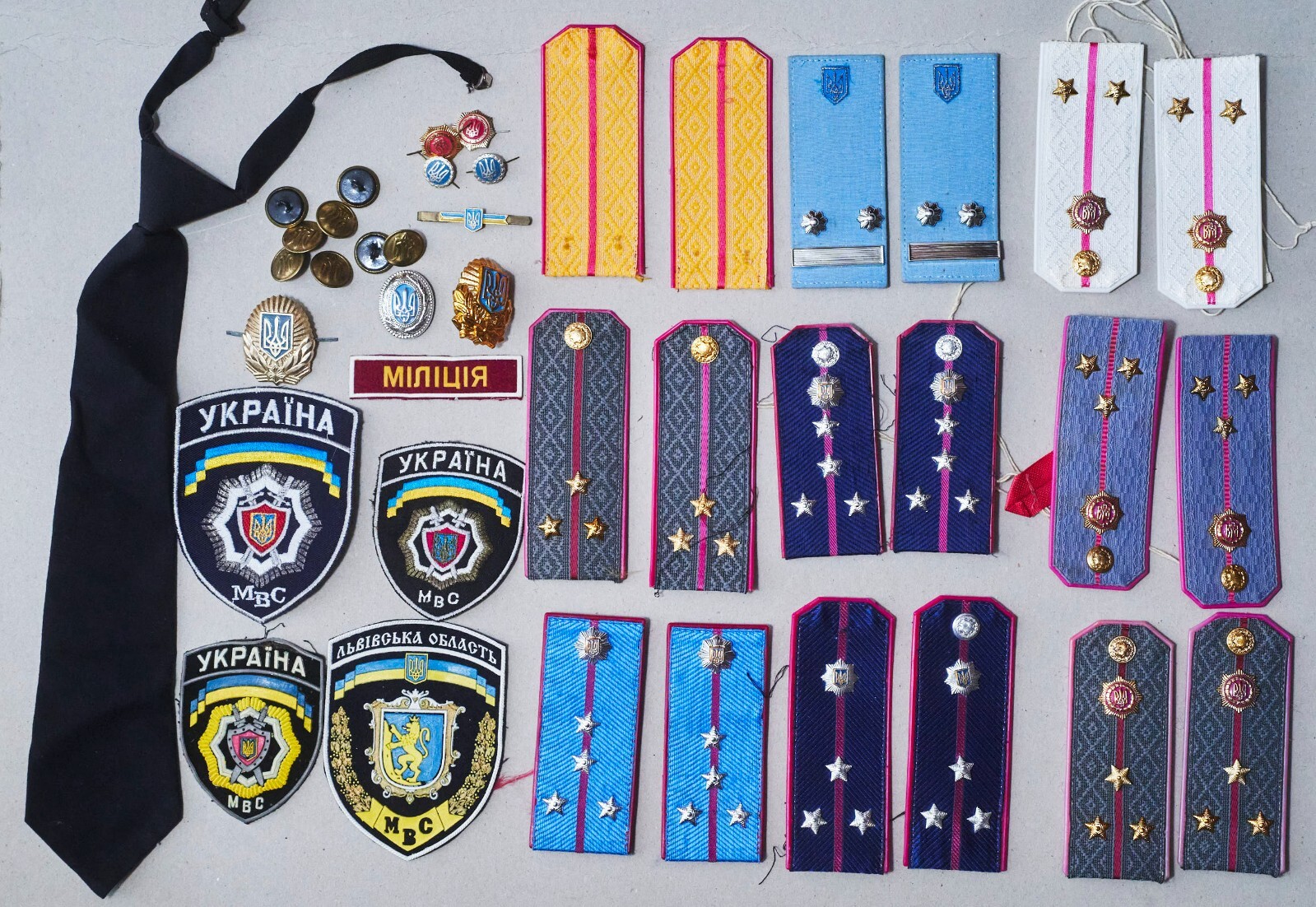 A Set Of Ukraine Police OFFICER Shoulder Boards, Patches,  Tie Clip, Badges Etc.