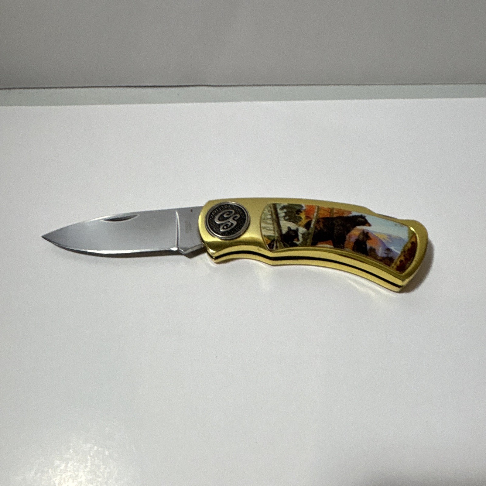 Collector’s Series Pocket Knife, Gold Colored Handle With Bear Art