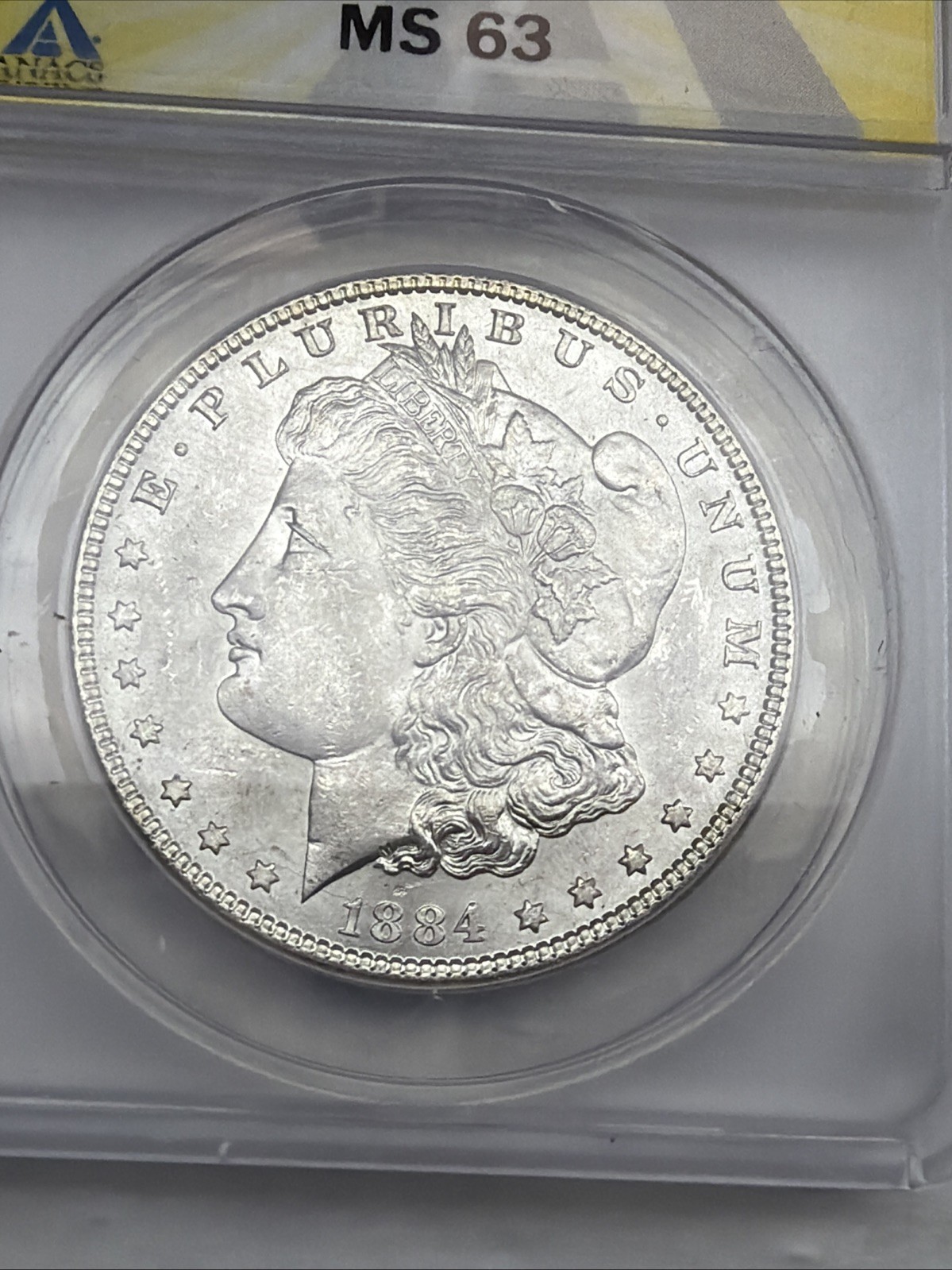 1884 Morgan Silver Dollar ANACS MS63 90% Silver