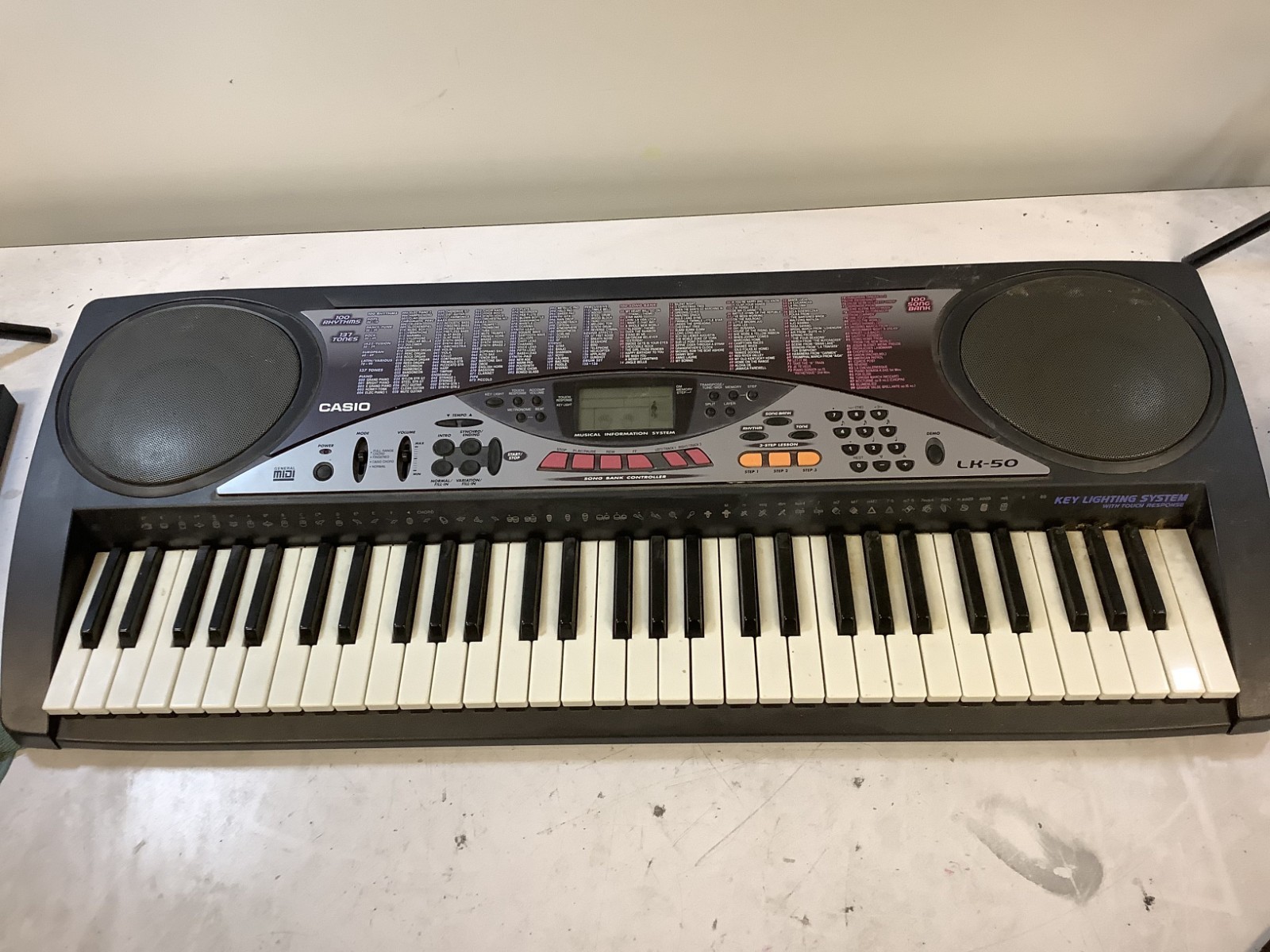 Casio LK-50 61-Key Touch-Sensitive Lighted-Key Digital Piano, Black "S1A"