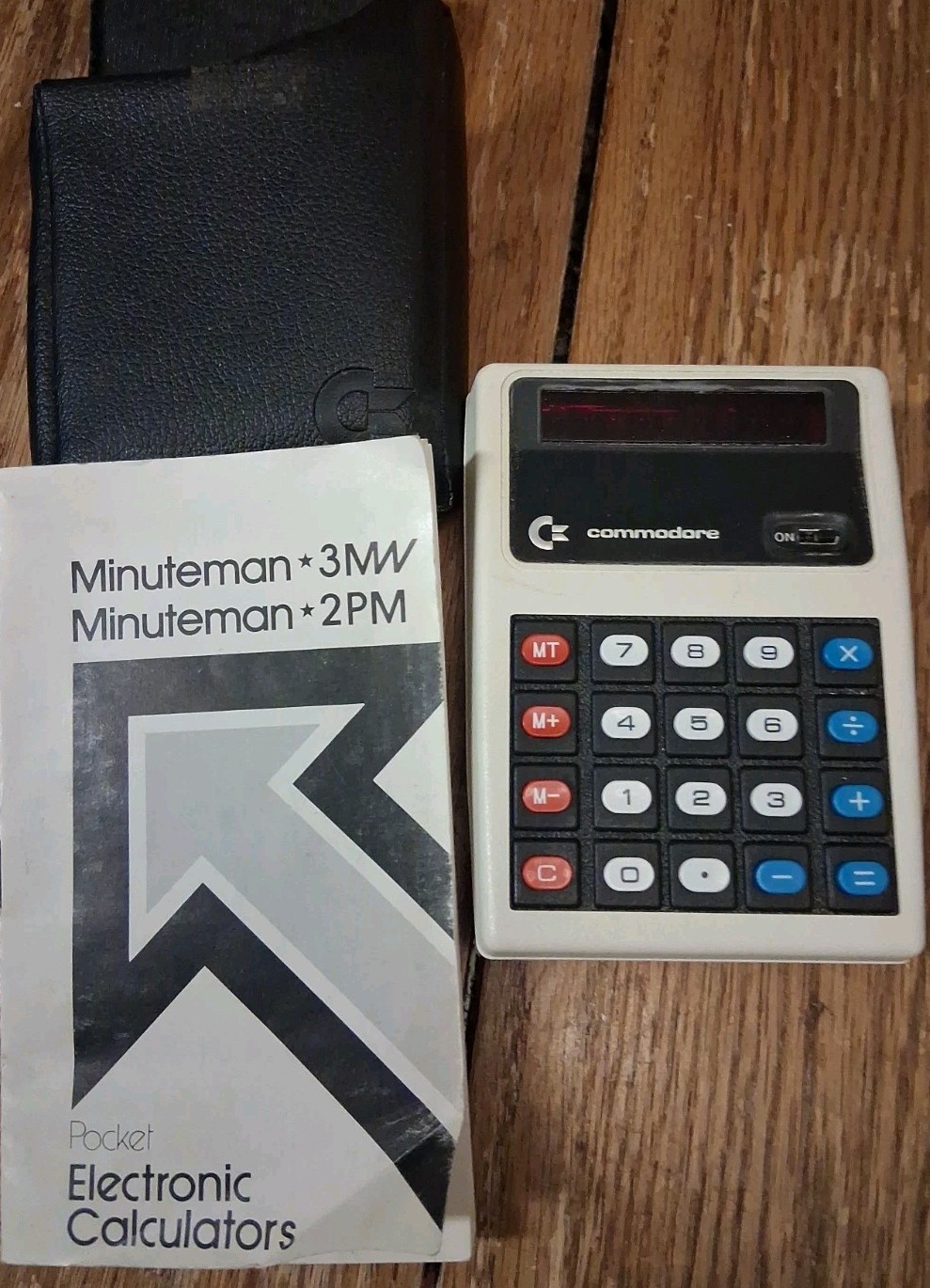 Commodore Minuteman Hand Held Calculator W/ Case and Manual*. Untested