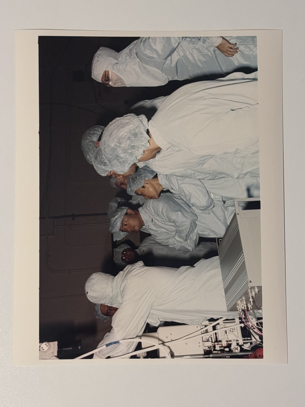 NASA STS-65 Crew Examine IML-2 Payload Elements Press Photo