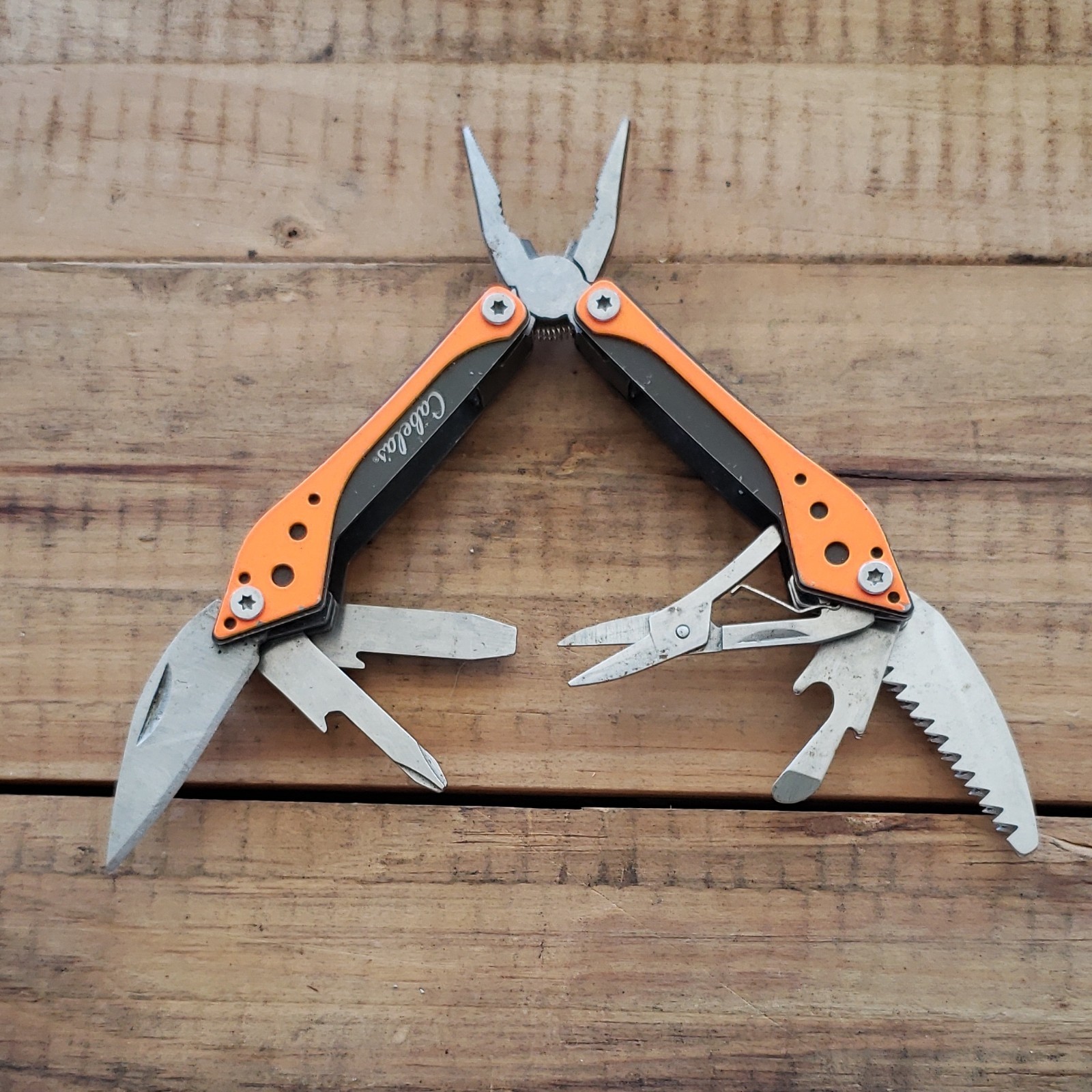 Cabela's Multi-Tool Pliers Knife Saw Scissors, Orange/Black, CB-001