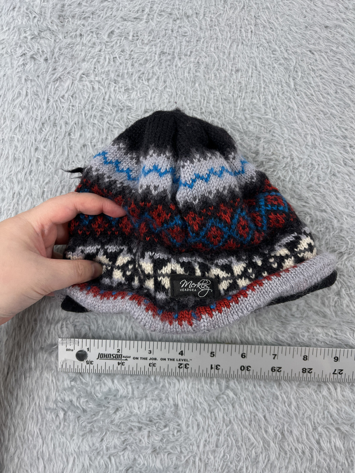 Merkley Beanie Toque Adult One Size Black Geometric Wool Poly Tassel Polartec