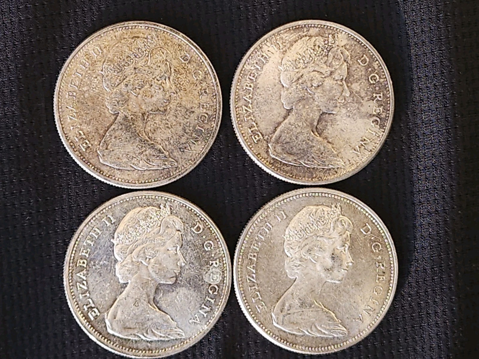 Lot of 4 Canadian Silver Dollars