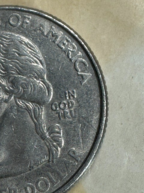 2001 US Quarter (NY), Grease Filled Die Error 'In God __ Tru__'