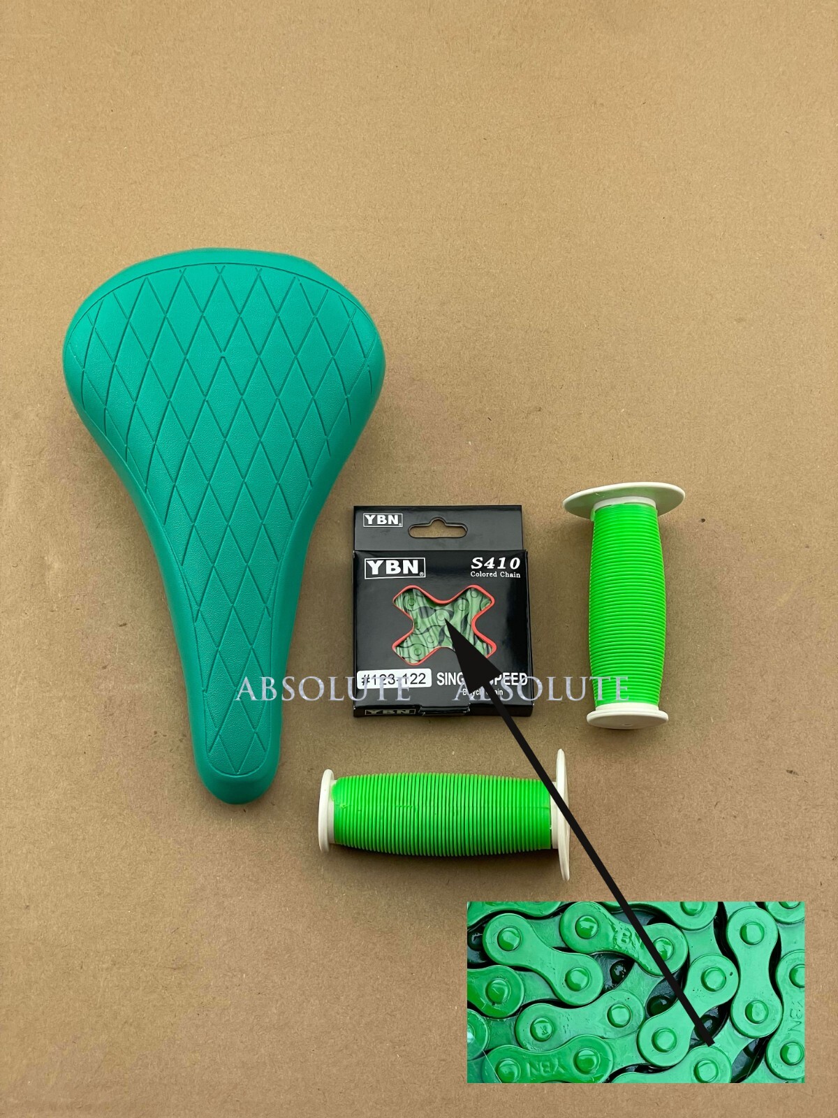 GREEN DIAMOND STITCHED BMX BIKE SADDLE W/ BMX KMC CHAIN &MUSHROOM STYLE GRIPS.