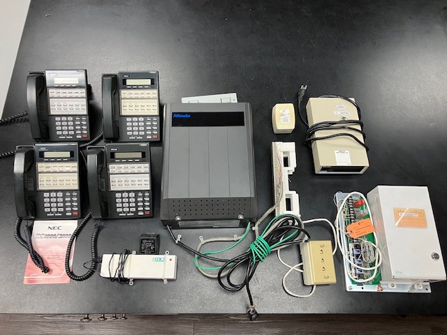 Nitsuko Phone System Model and 4 Phones + other system accessories