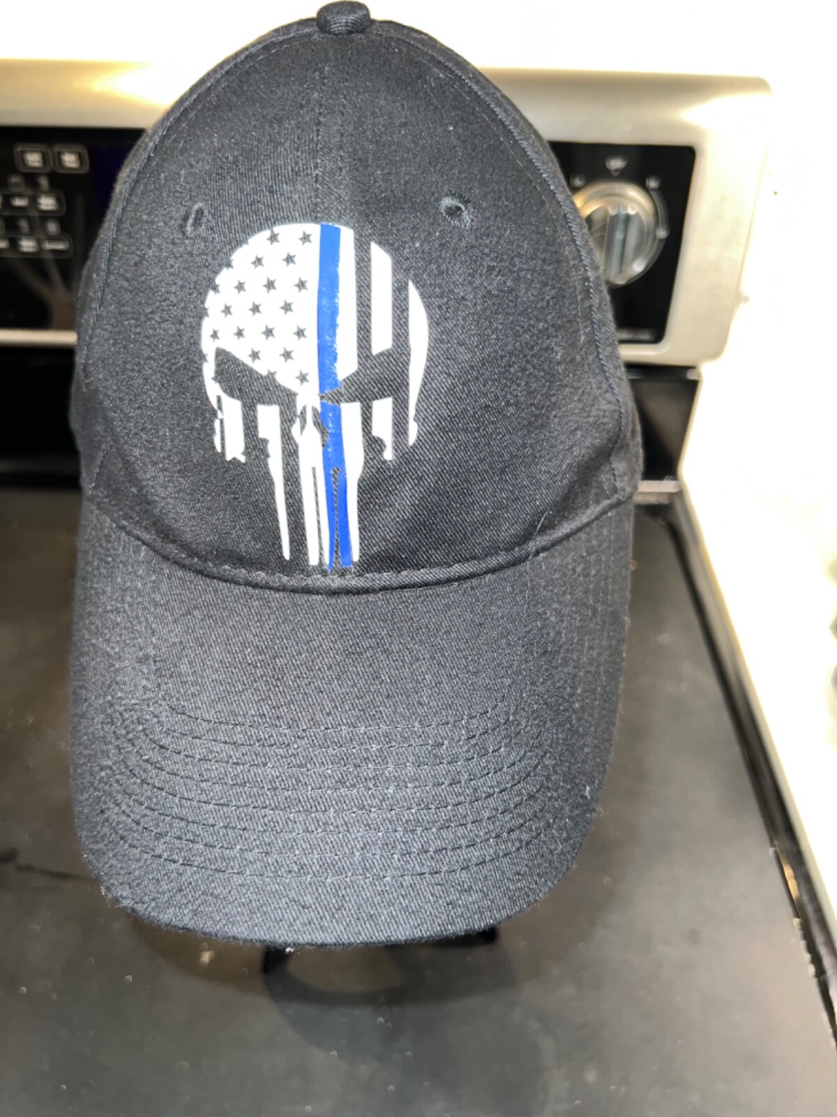 Black Hat Punisher on Front is white/blue ONSFA EUC