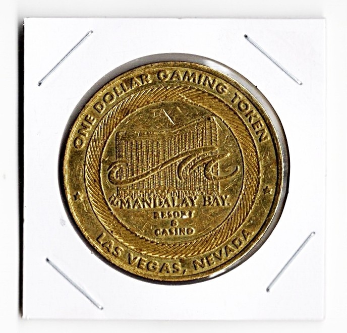 1999 MANDALAY BAY CASINO LAS VEGAS NEVADA $1 CASINO SLOT COIN CG071373