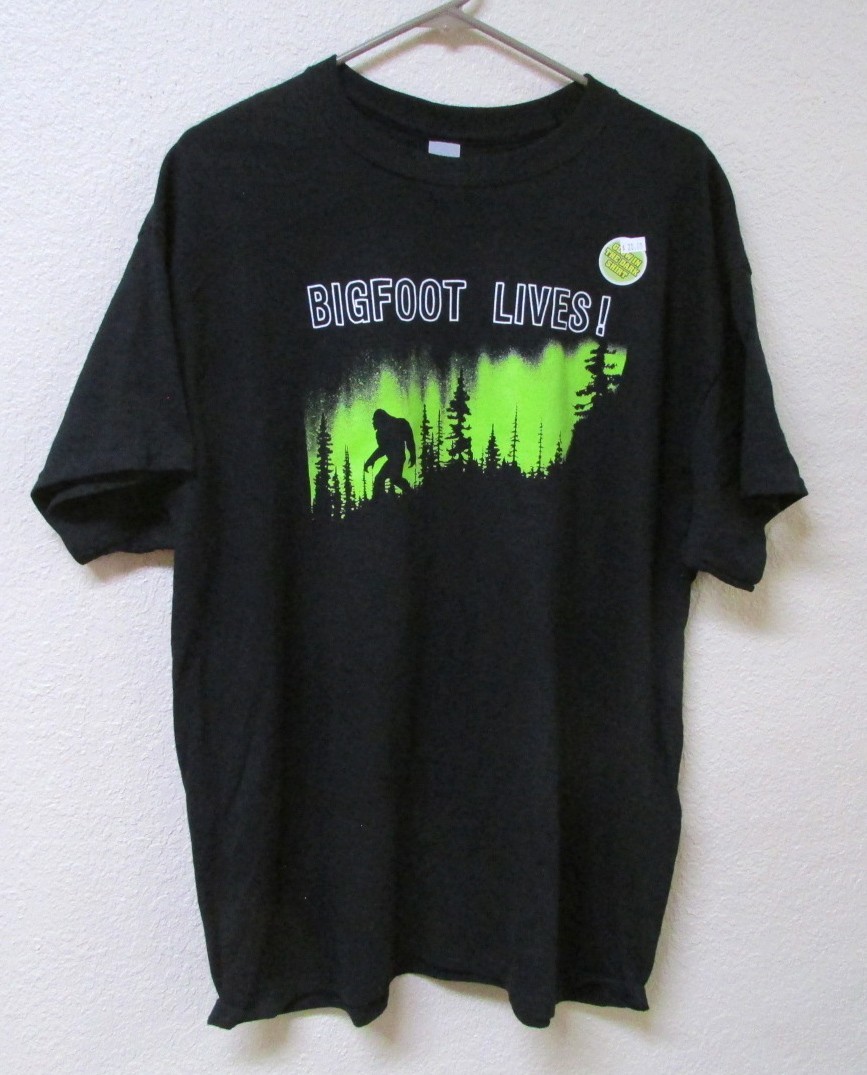 Bigfoot lives! glow in the dark logo, Black T-shirt tshirt, Adult size XXL (2xl)