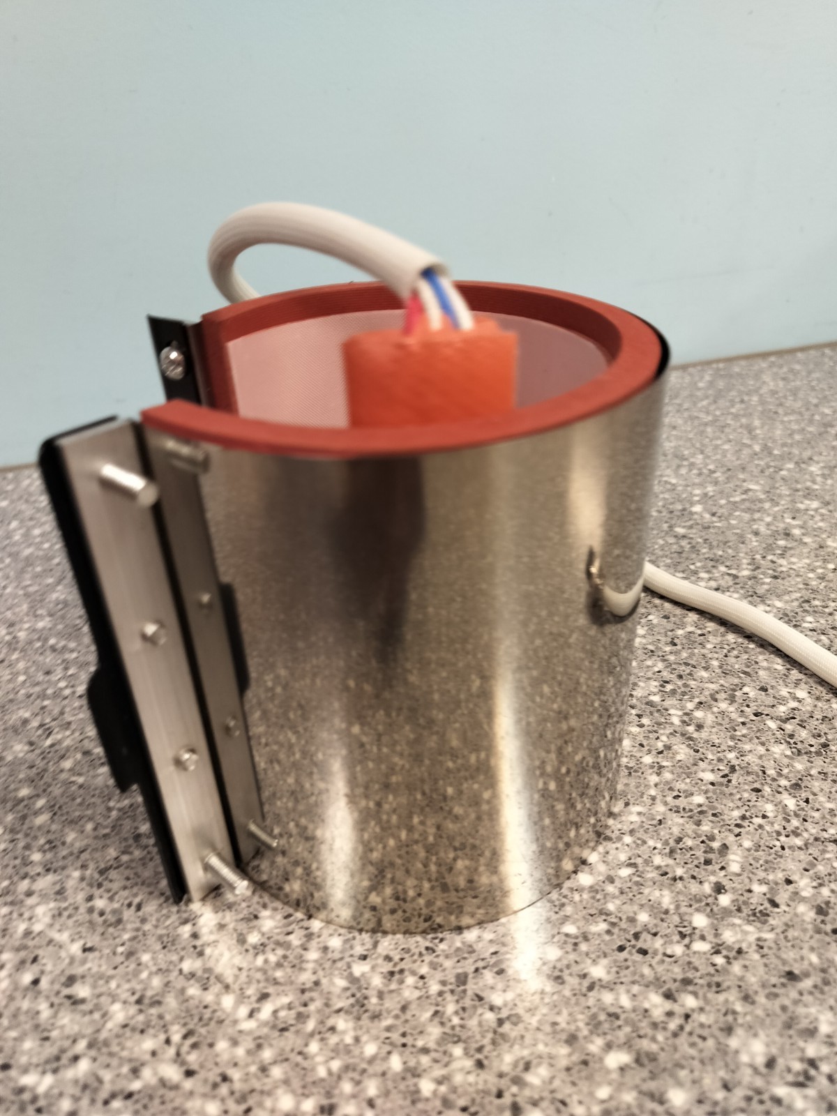 Mug heating element Attached For A Mug Heat Press Machine.