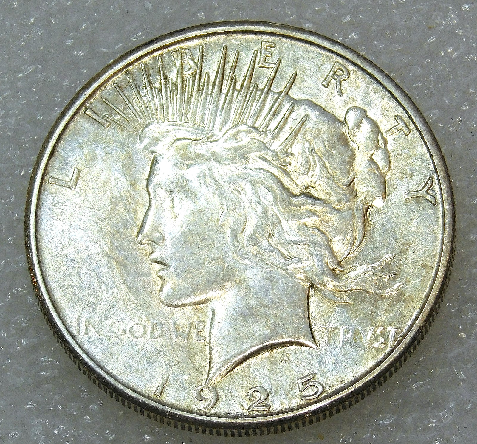 1925-S Peace Silver Dollar AU Frosty luster in saflip #M394