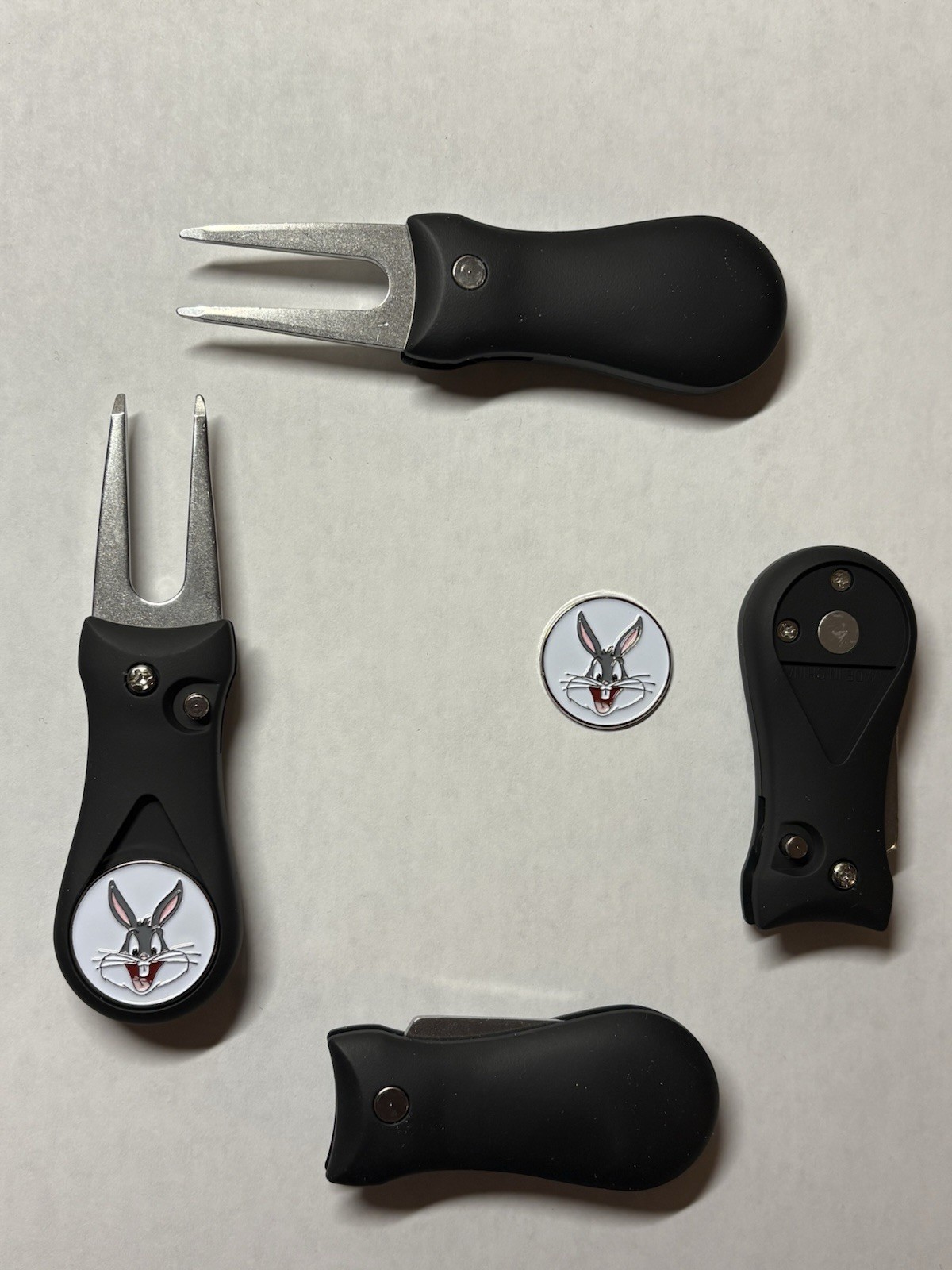 (1)  Switchblade Golf Divot Tool & (1) Bugs Bunny Looney Tunes Coin Golf Marker