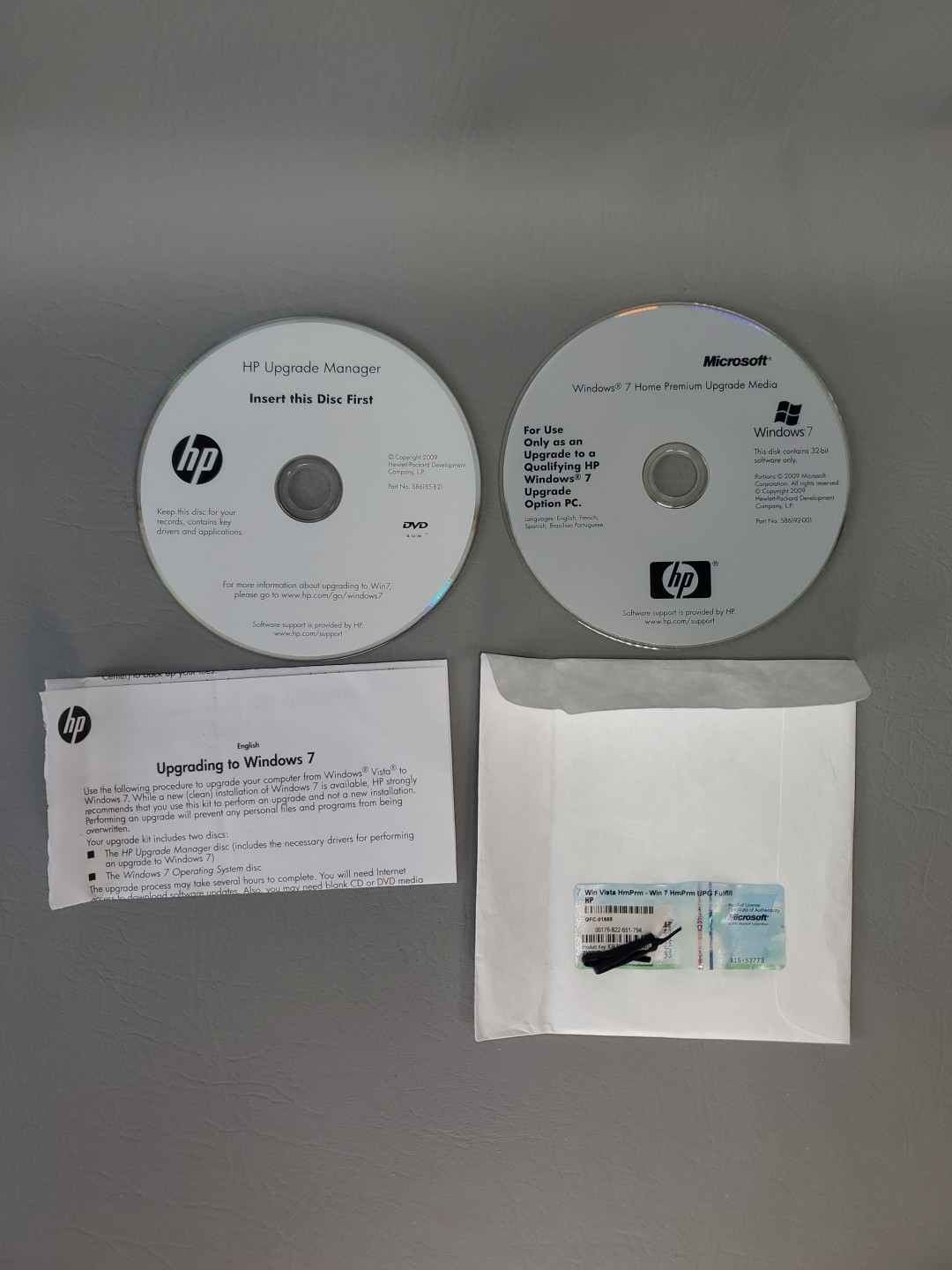 HP Microsoft Windows 7 Home Premium Upgrade Media & HP Upgrade Manager DVD (2)