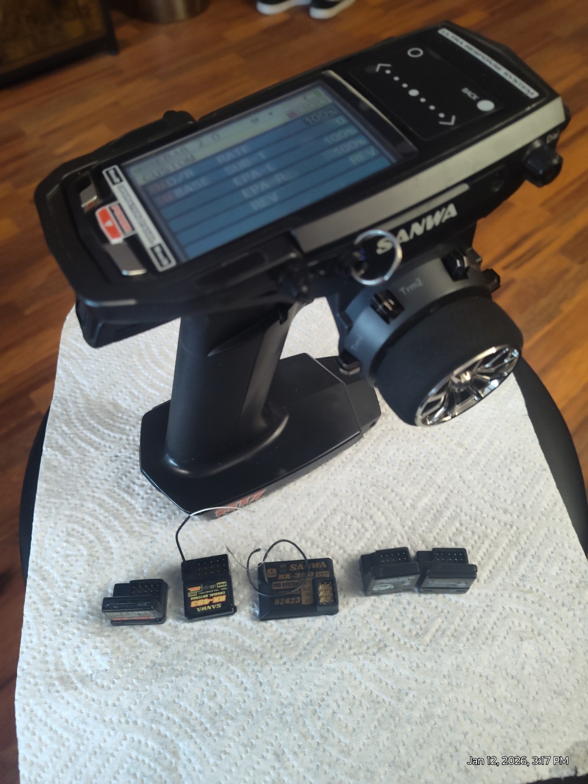 Sanwa/Airtronics M17 Pro RC racing transmitter with 5 receivers and hardcase.
