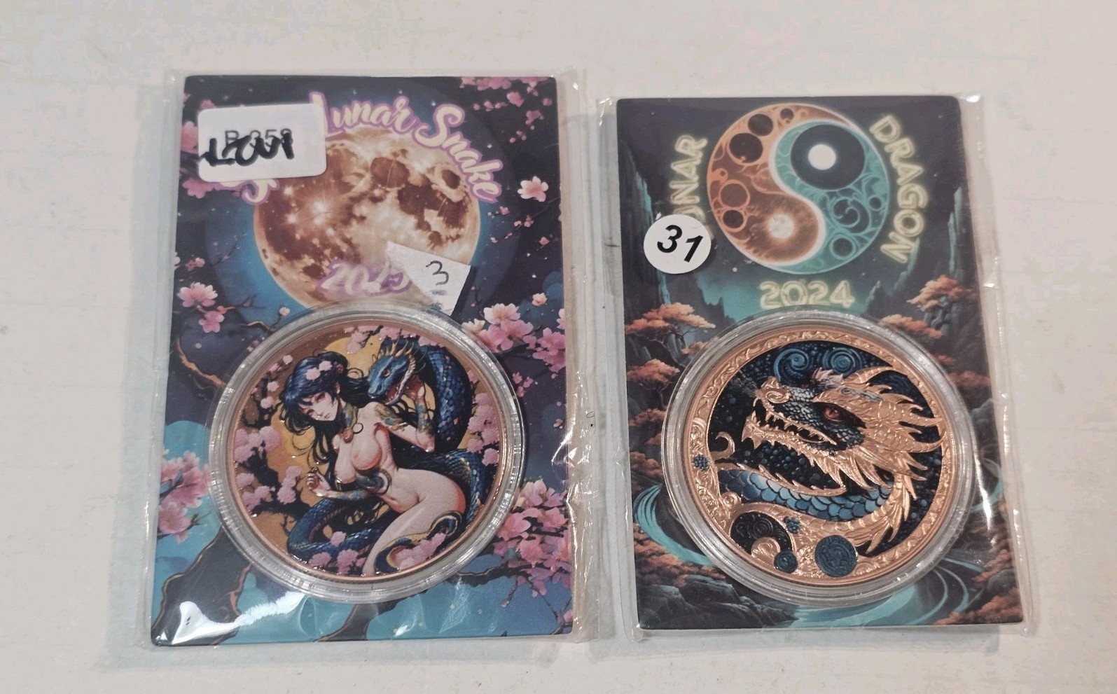 2025 Year of the Spicy Lunar Snake  Colorized Copper. And 2024 Lunar Dragon 66G