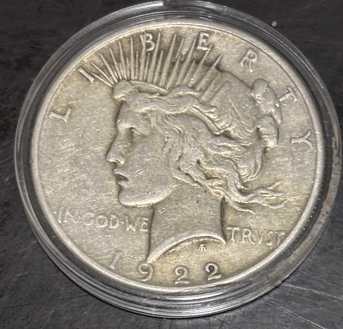 1922 $1 Peace Dollar Coin, capsule included.  .90 Silver