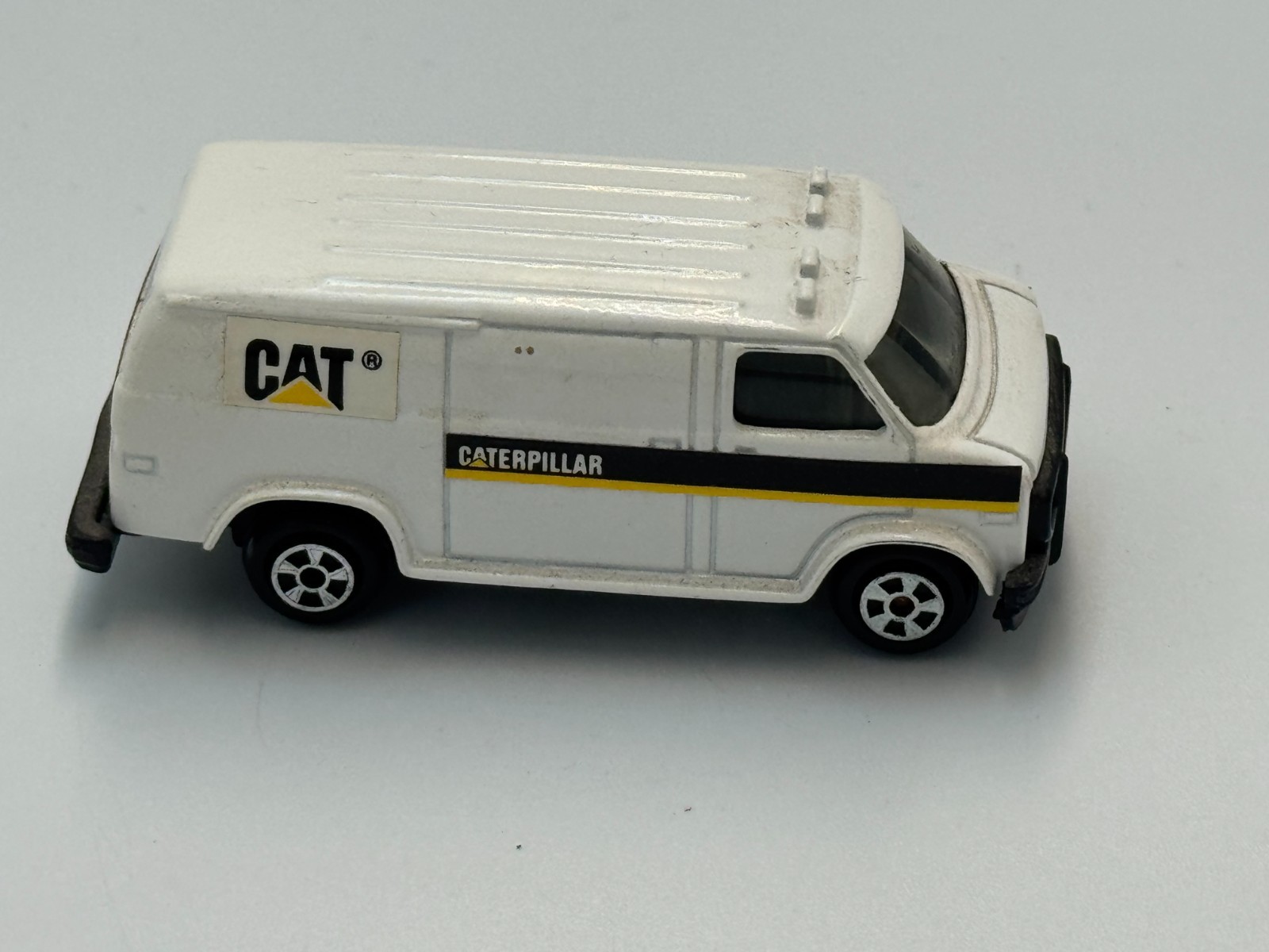1/64  ERTL CAT Chevrolet Dealership Van