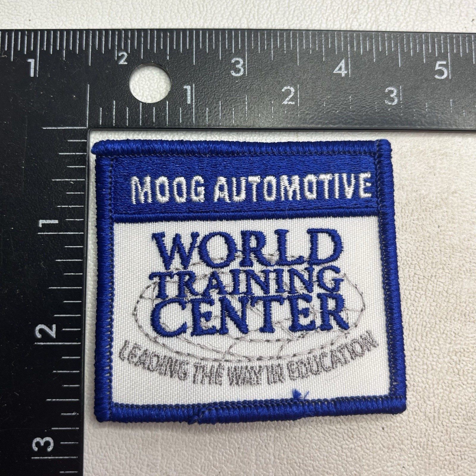 Vintage c 1990s MOOG AUTOMOTIVE WORLD TRAINING CENTER Car Education Patch AAAE