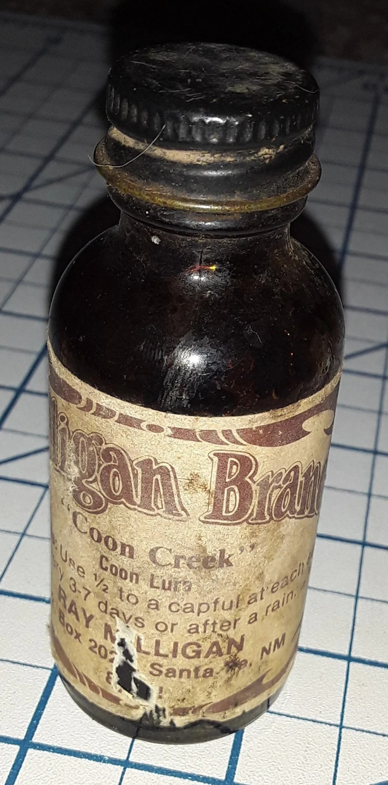 1950s COON LURE by Milligan Brand Glass Bottle Jar Hunting Vintage Scent Hunt