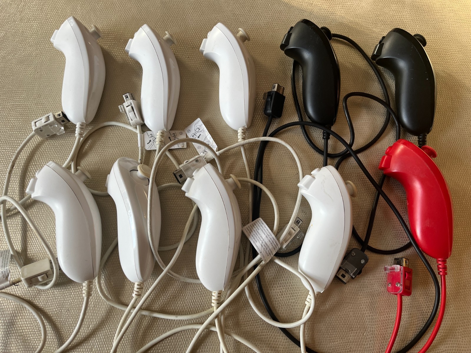 10 Official Nintendo Wii Nunchuck Controllers - 7 White, 2 Black, 1 Red ALL USED