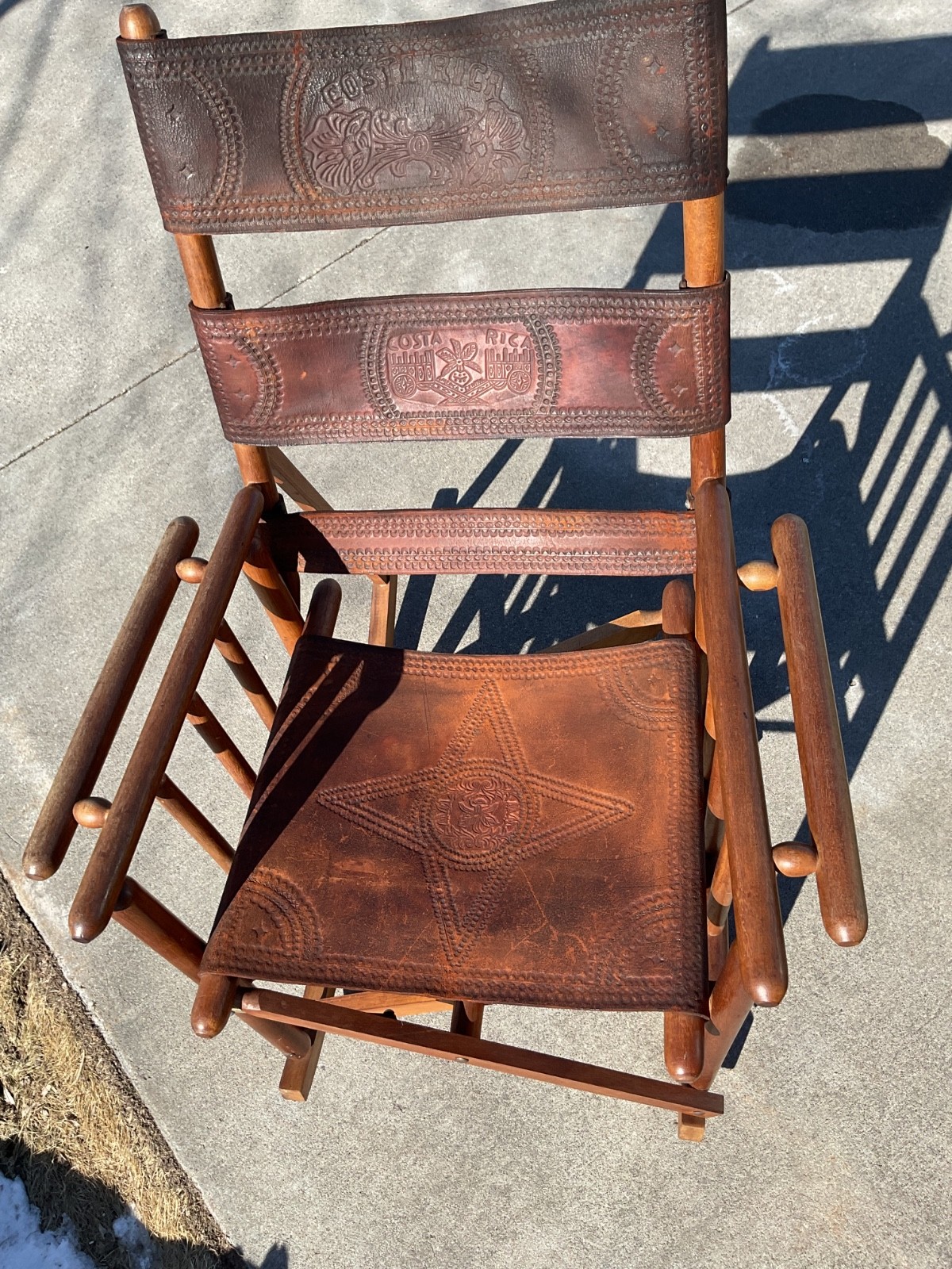 Vintage leather and teak wood embossed Costa Rica rocking chair 45" foldable