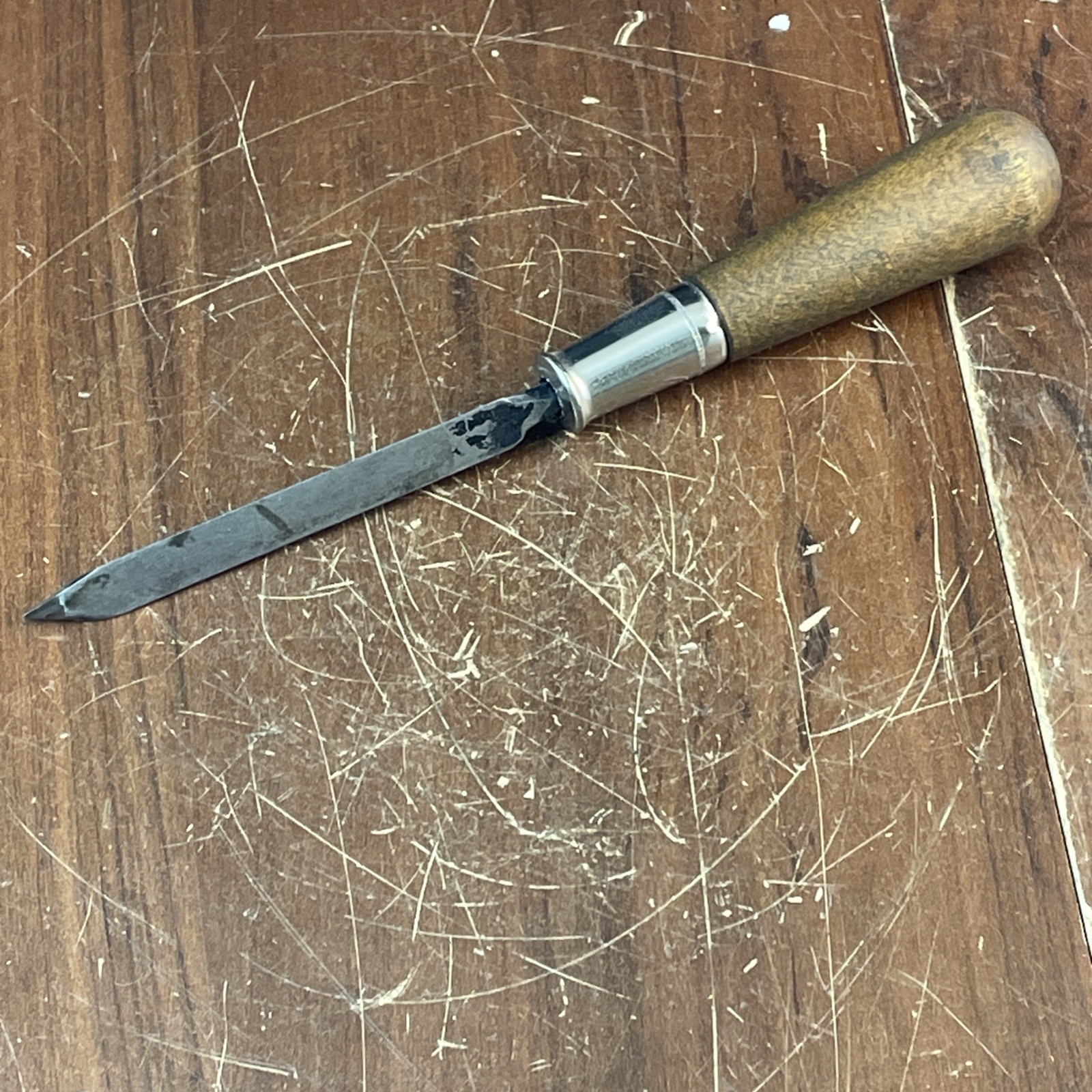 Triangular Scraper