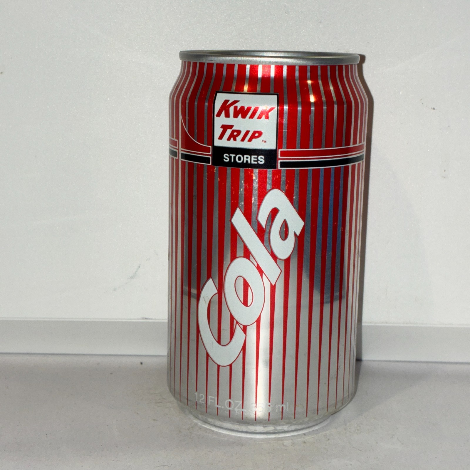 Kwik Trip Cola Soda can, bottom opened