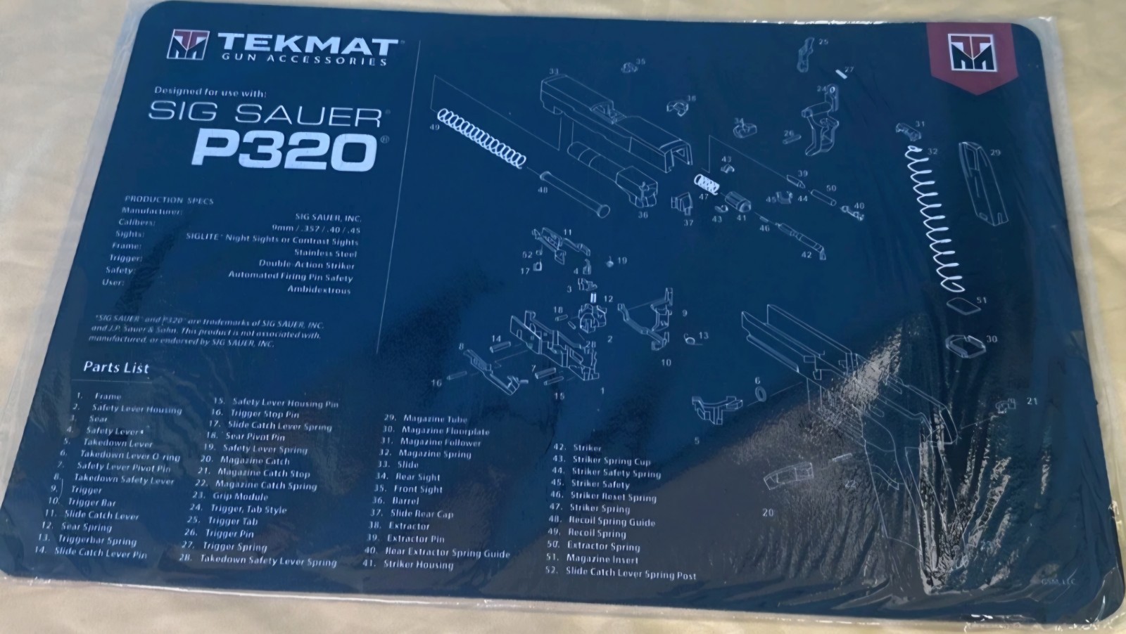 TekMat Non-Skid Cleaning Mat Featuring Sig Sauer P320, Black 17" X 11"