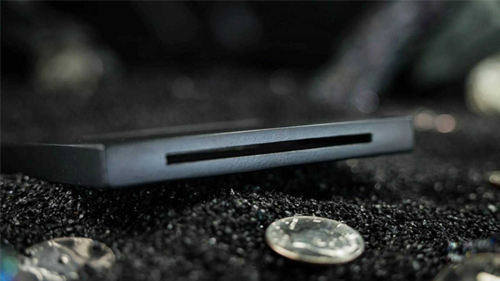 Coin Thru Anything by Nathan Kranzo