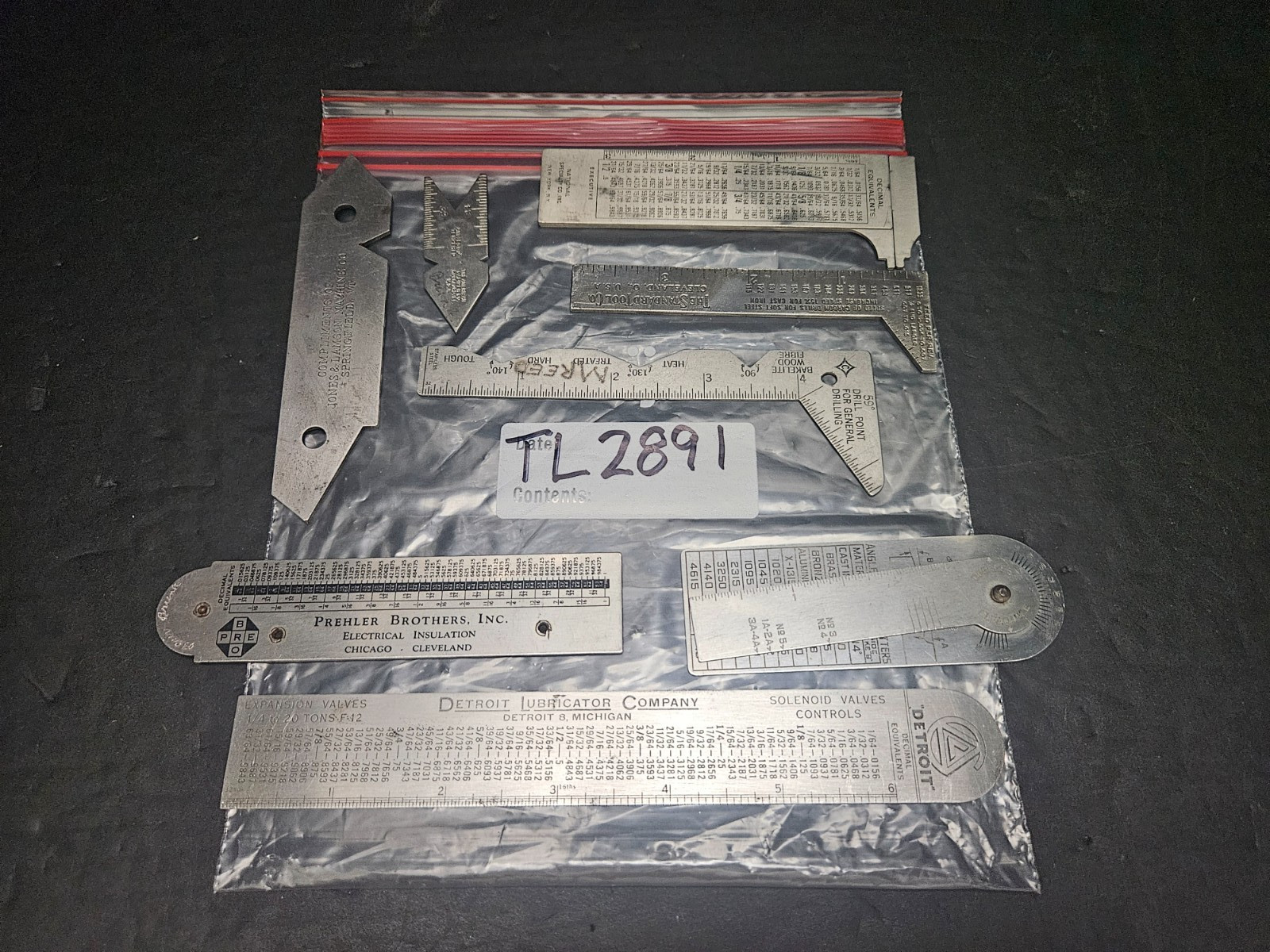 A LOT OF 8 ADVERTISING MACHINIST GAGES (TL2891)