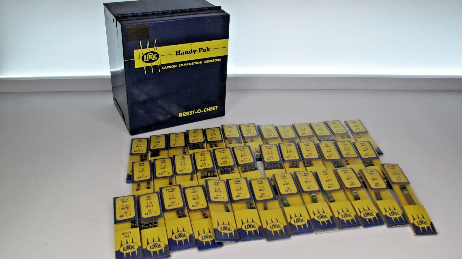 NOS Lot of Vintage IRC Carbon Comp Resistors with Original Steel Container