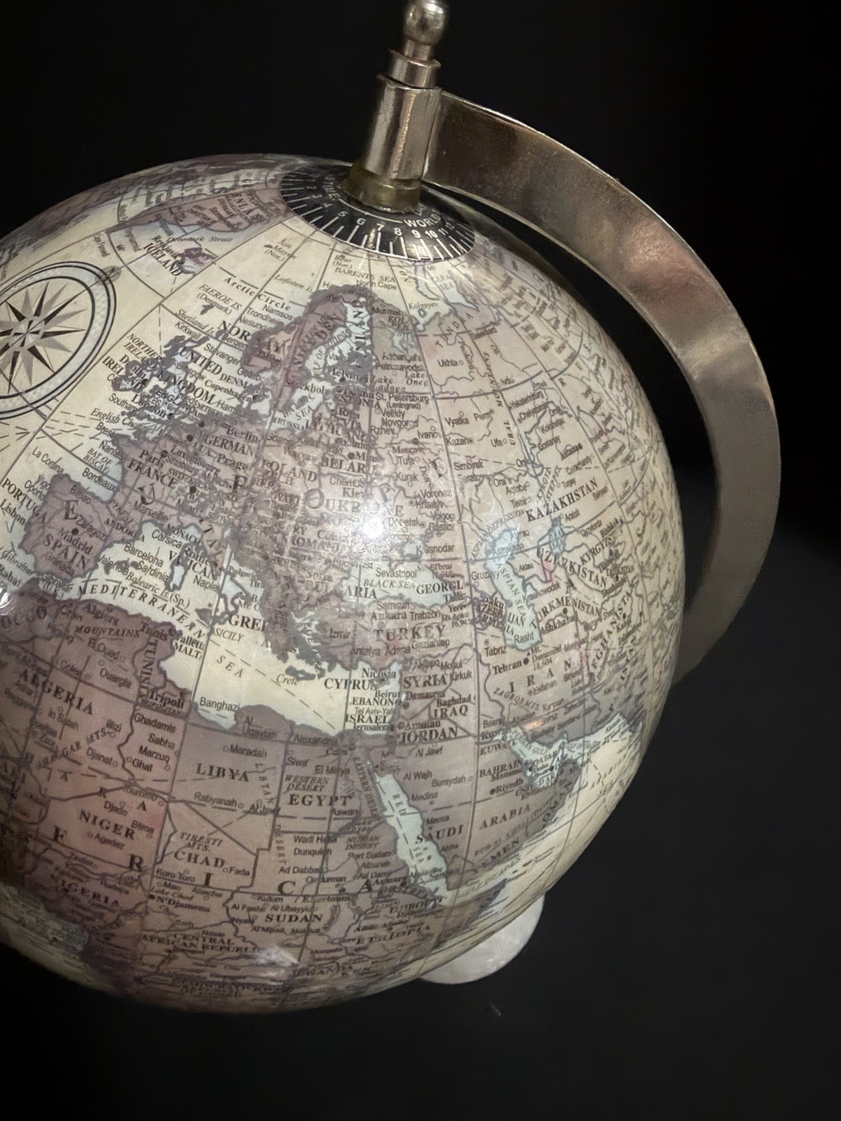 Small decorative table globe with white marble base