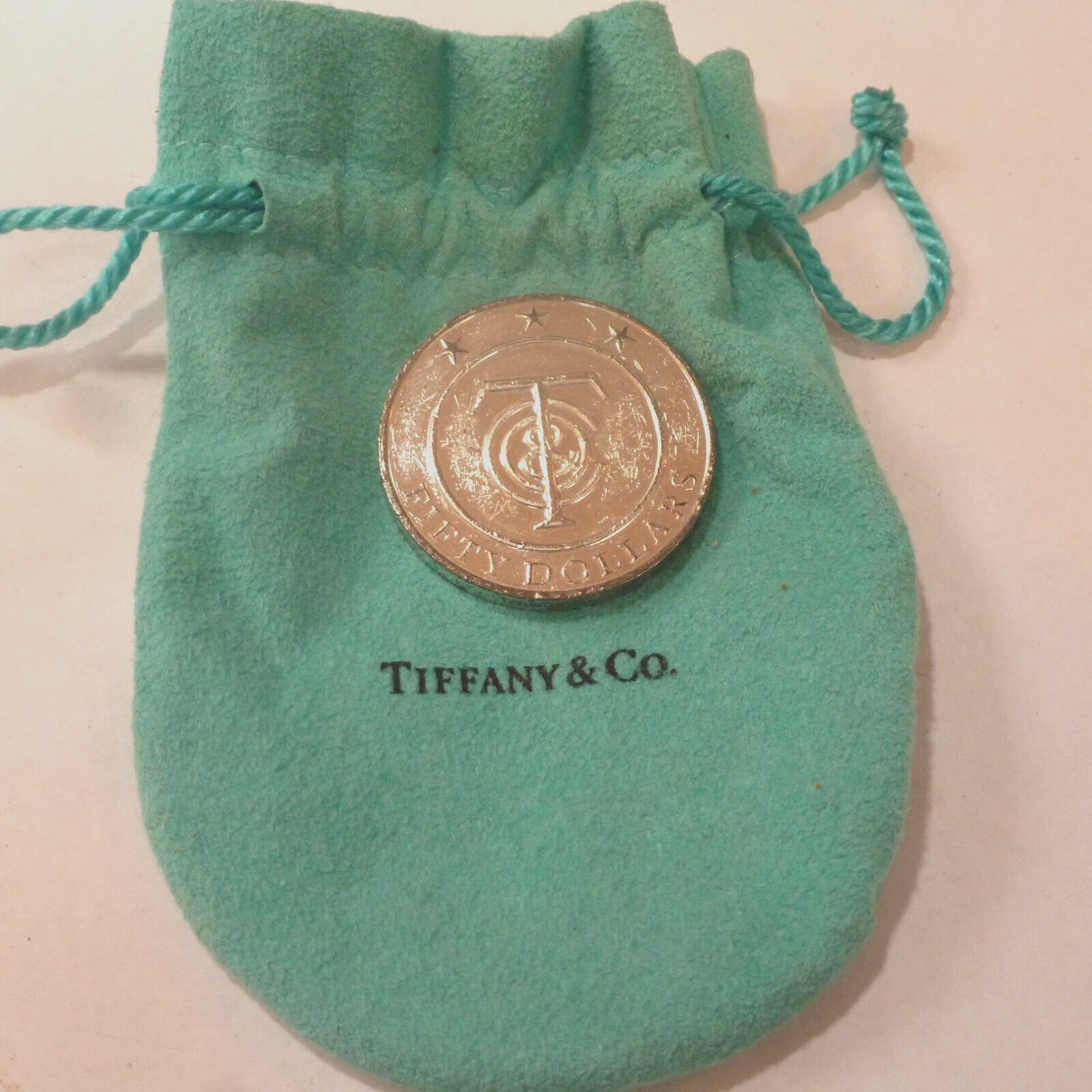 TIFFANY 50 DOLLAR STERLING SILVER REDEEMABLE IN MERCHANDISE COIN RETIRED