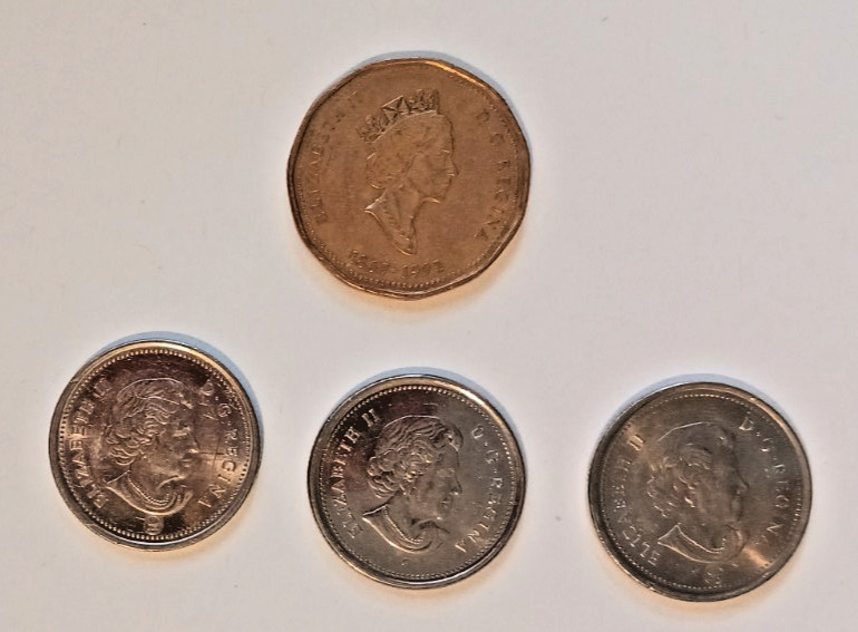 Canadian Coins 1992 $1, 2006, 2007, 2009 25c (4)
