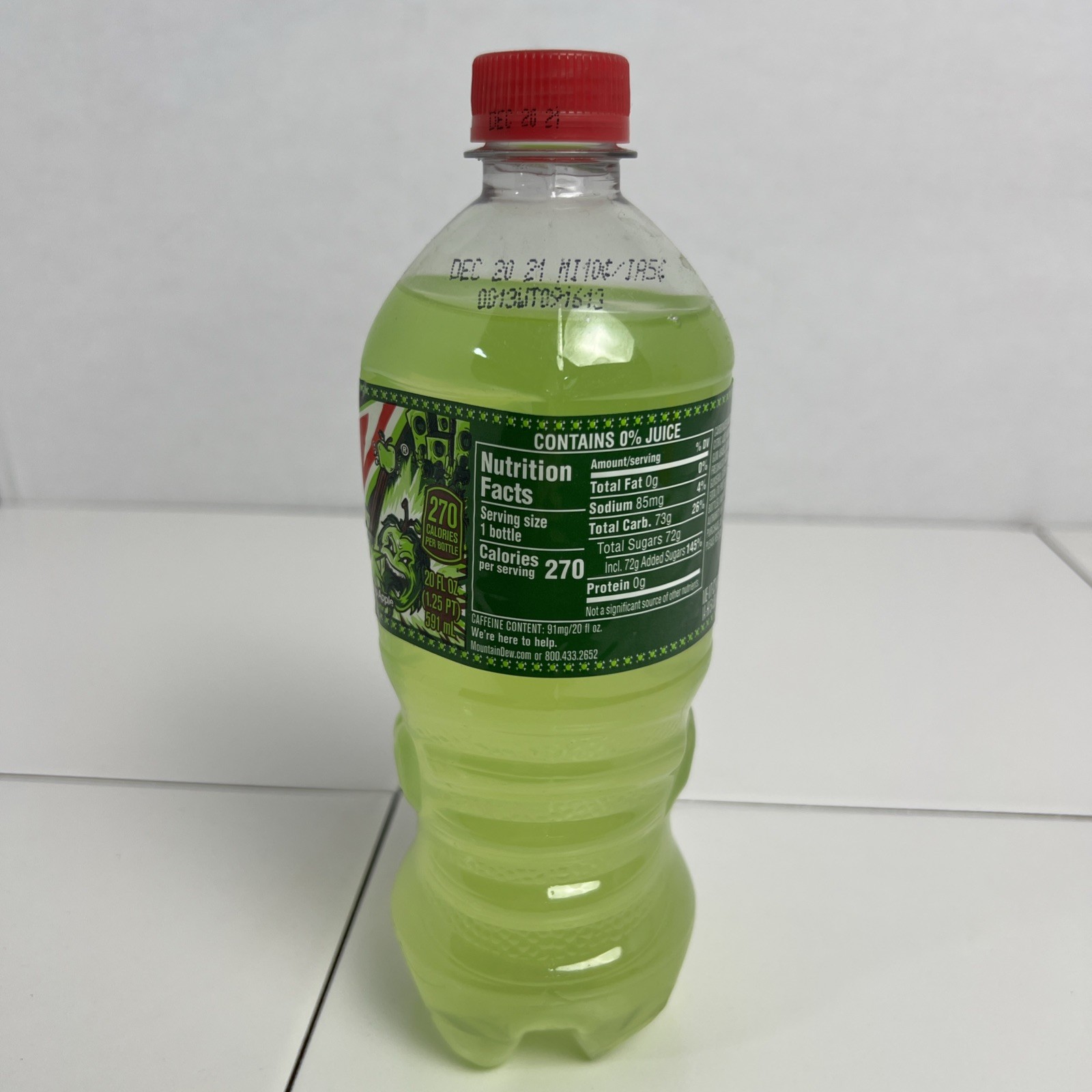 Trashed Apple Mountain Dew 2021, 20 Oz *Unopened, Expired Dec 20, 2021)