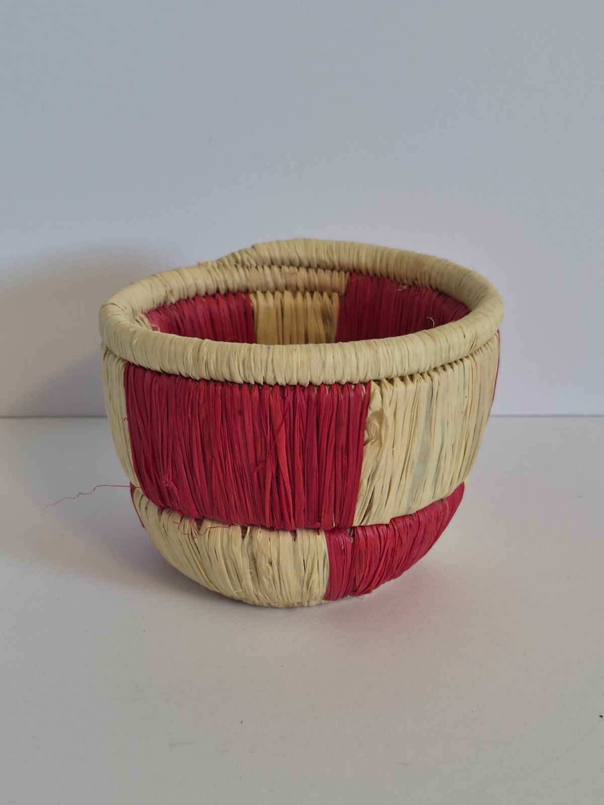 Handwoven Coiled Grass Basket Red Beige Natural Fibers 3x4 Inch