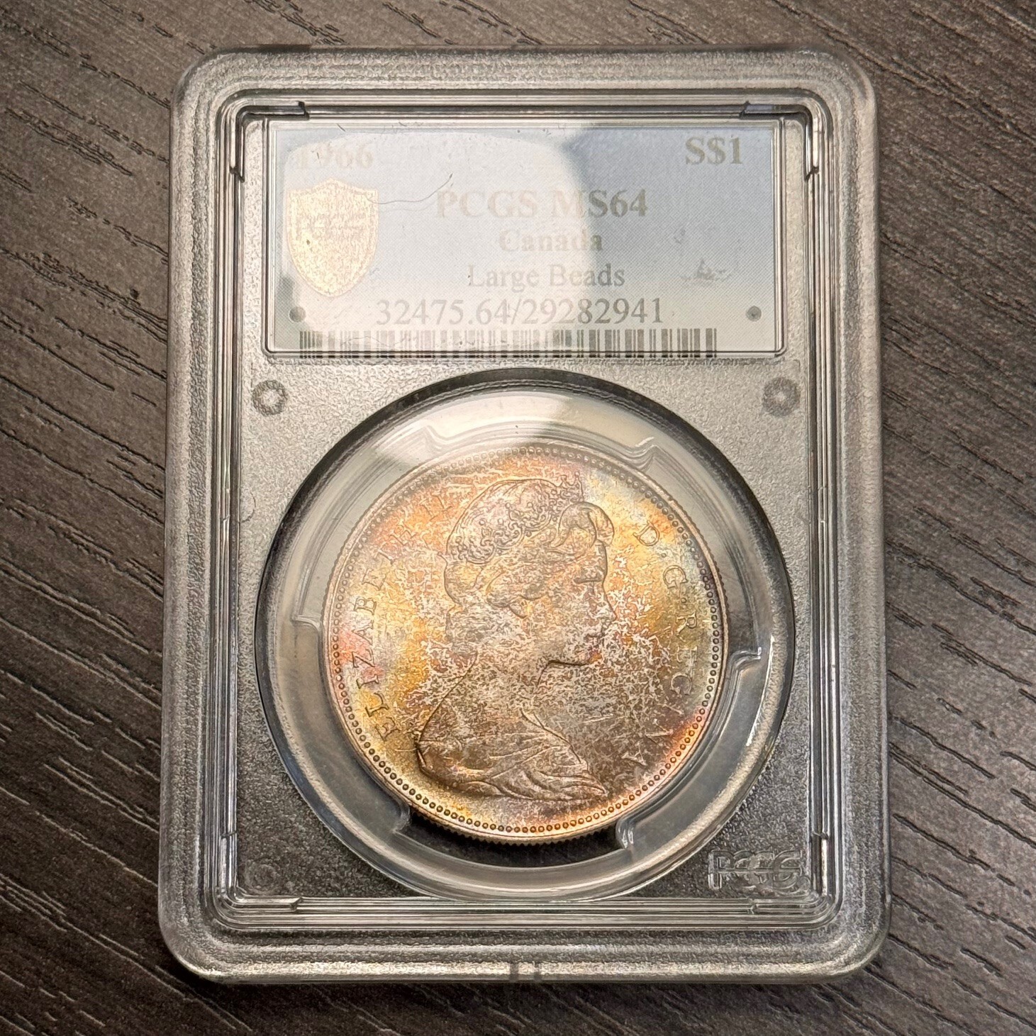 MS64 1966 $1 Canada Voyageur Silver Dollar, PCGS Trueview- Rainbow Toned