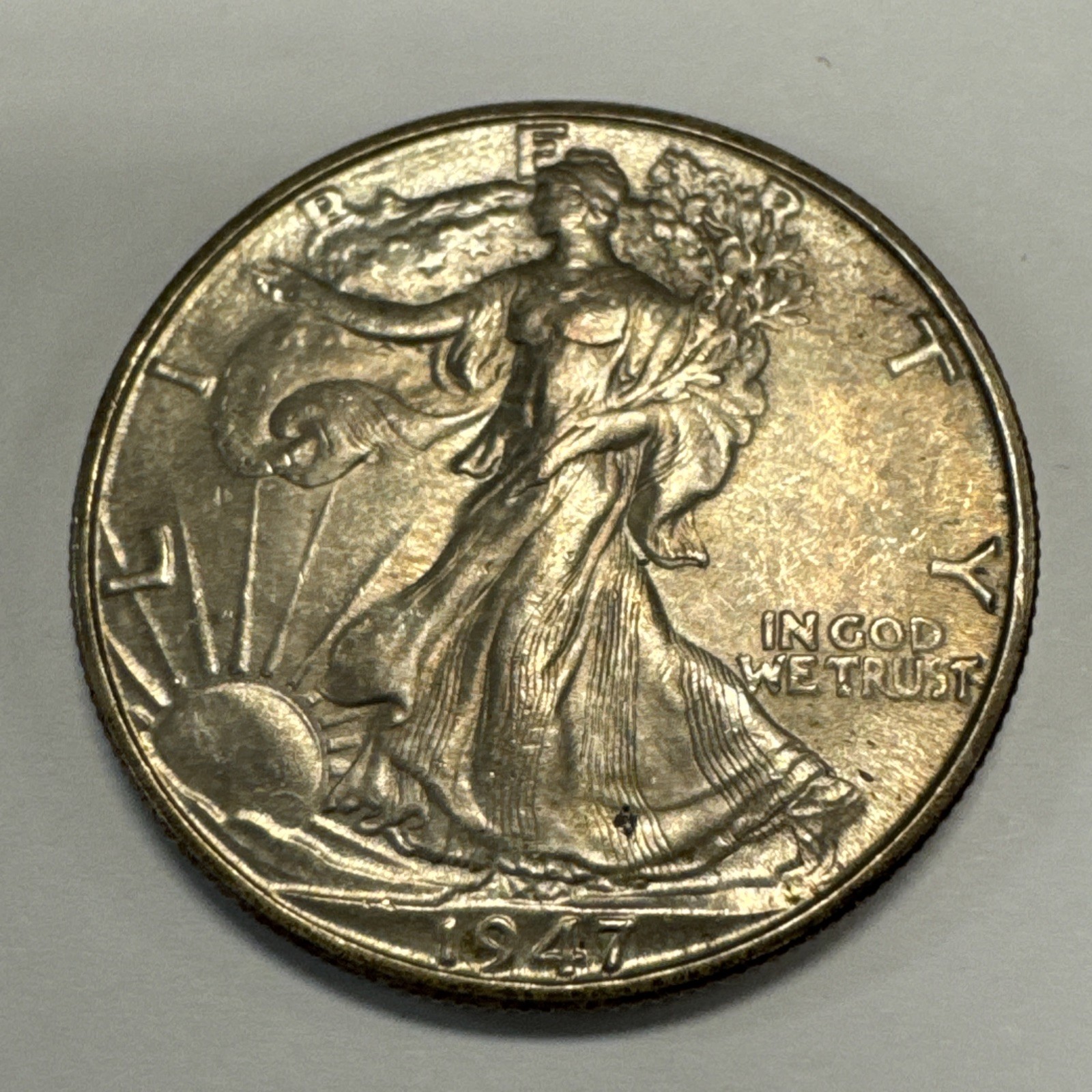 1947-D Walking Liberty Half Dollar Uncirculated-Toned