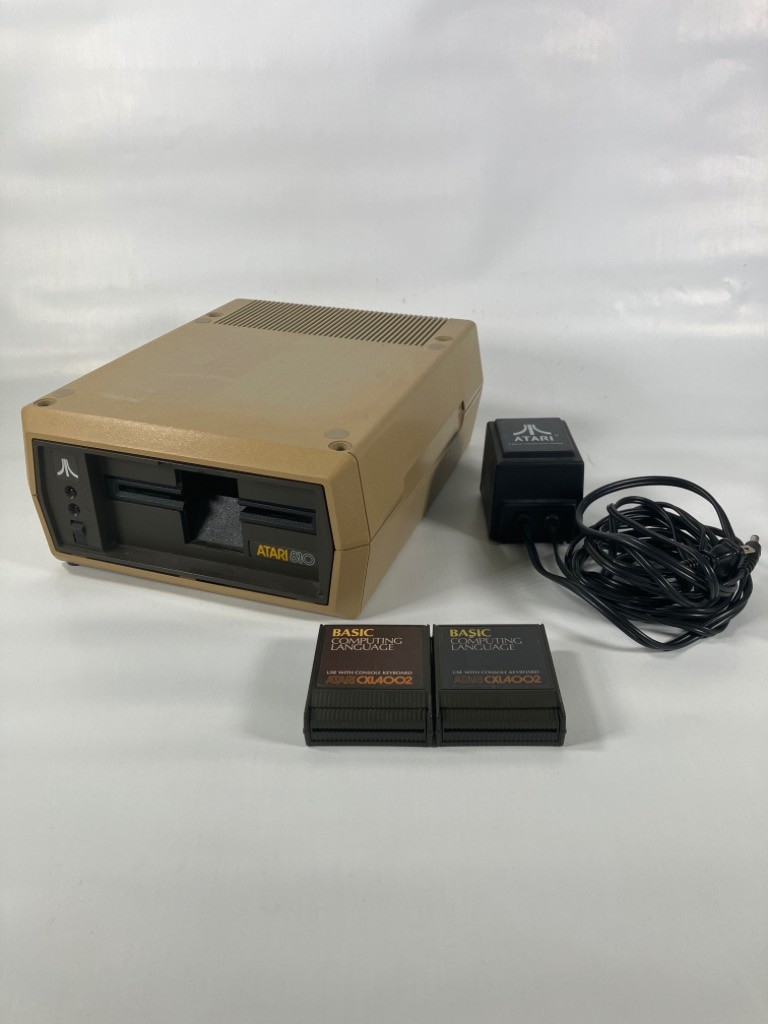 Atari 810 Disk Drive with 2 CXL4002 Cartridges and Power Supply - As Is