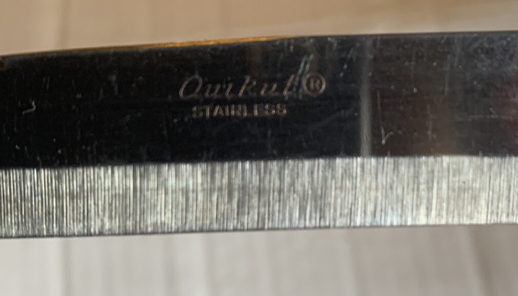 Quikut Stainless Knife With Marbled Plastic Handle