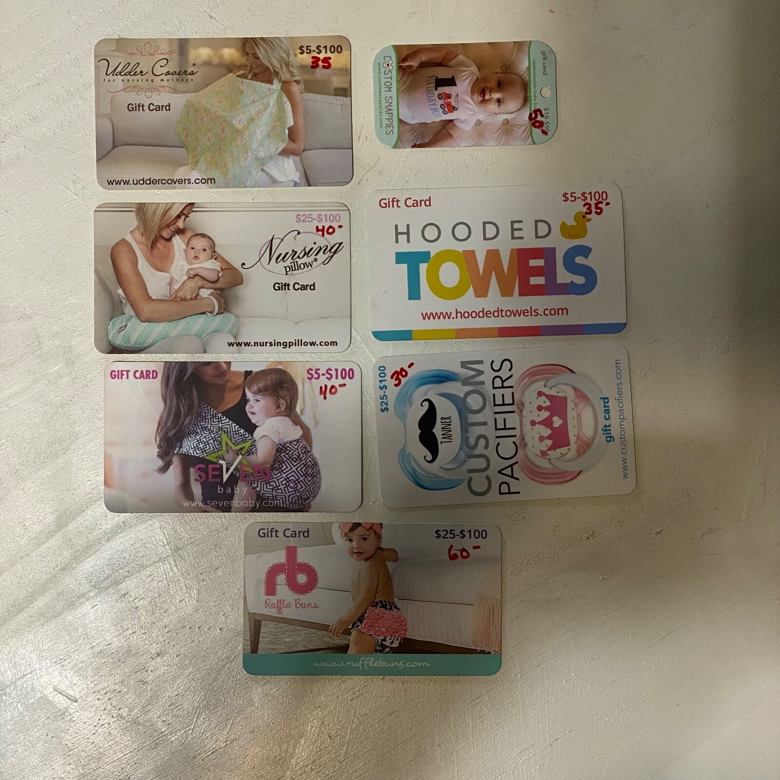 Lot of seven gift cards for baby items $290 value total amount on card see photo
