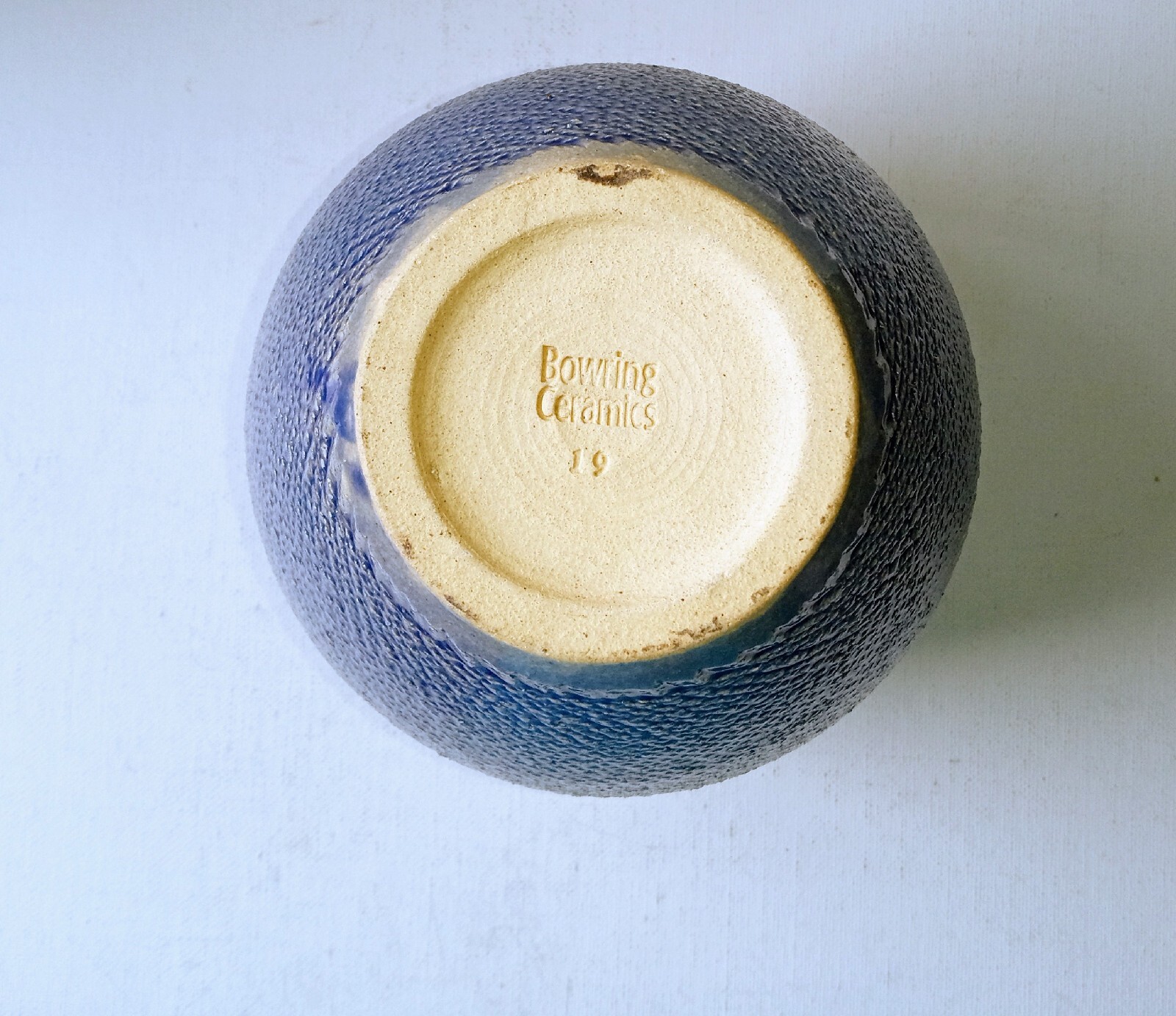 Bowring Ceramics Ginger Jar with lid. Light blue with impressed design.