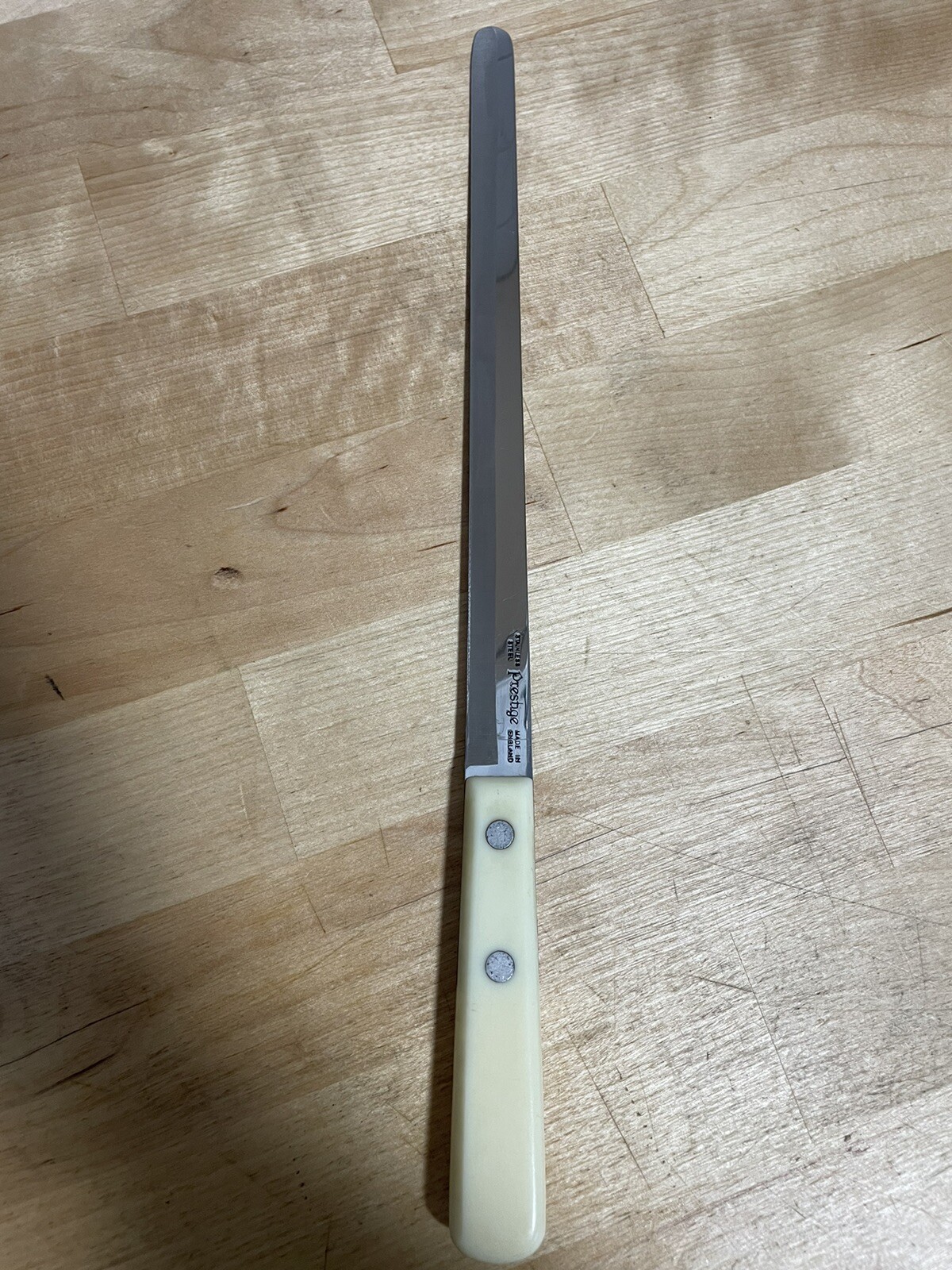 Vintage prestige Made In England bread cutting knife White Handle FREE SHIPPING